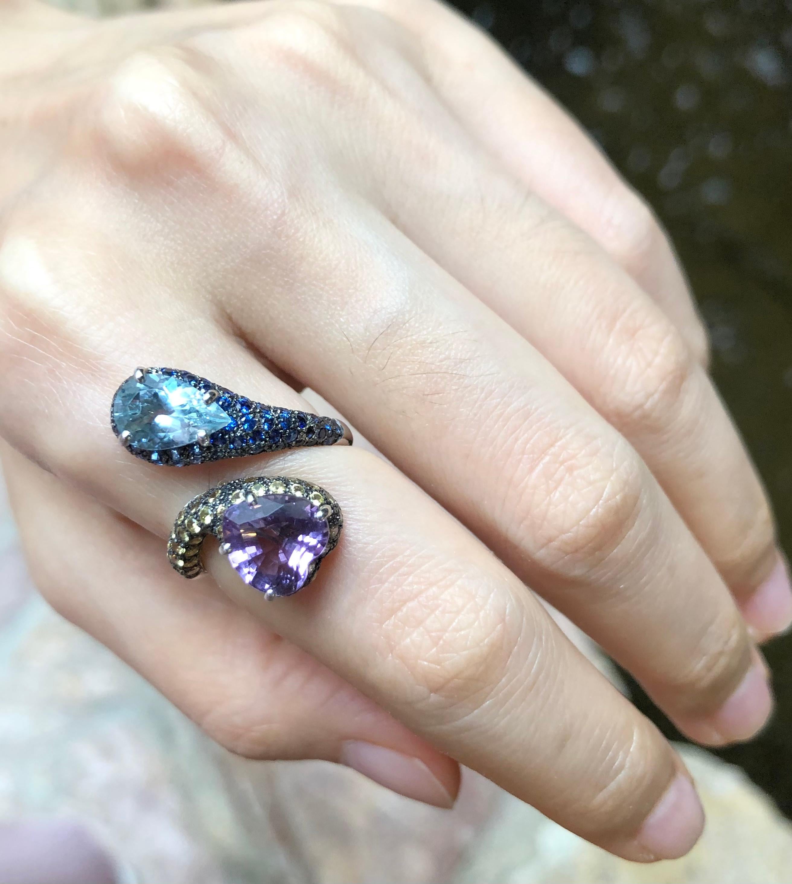 Marquise Shaped Blue Topaz Ring with Trillion Cut Amethyst Accents in – The  Castle Jewelry