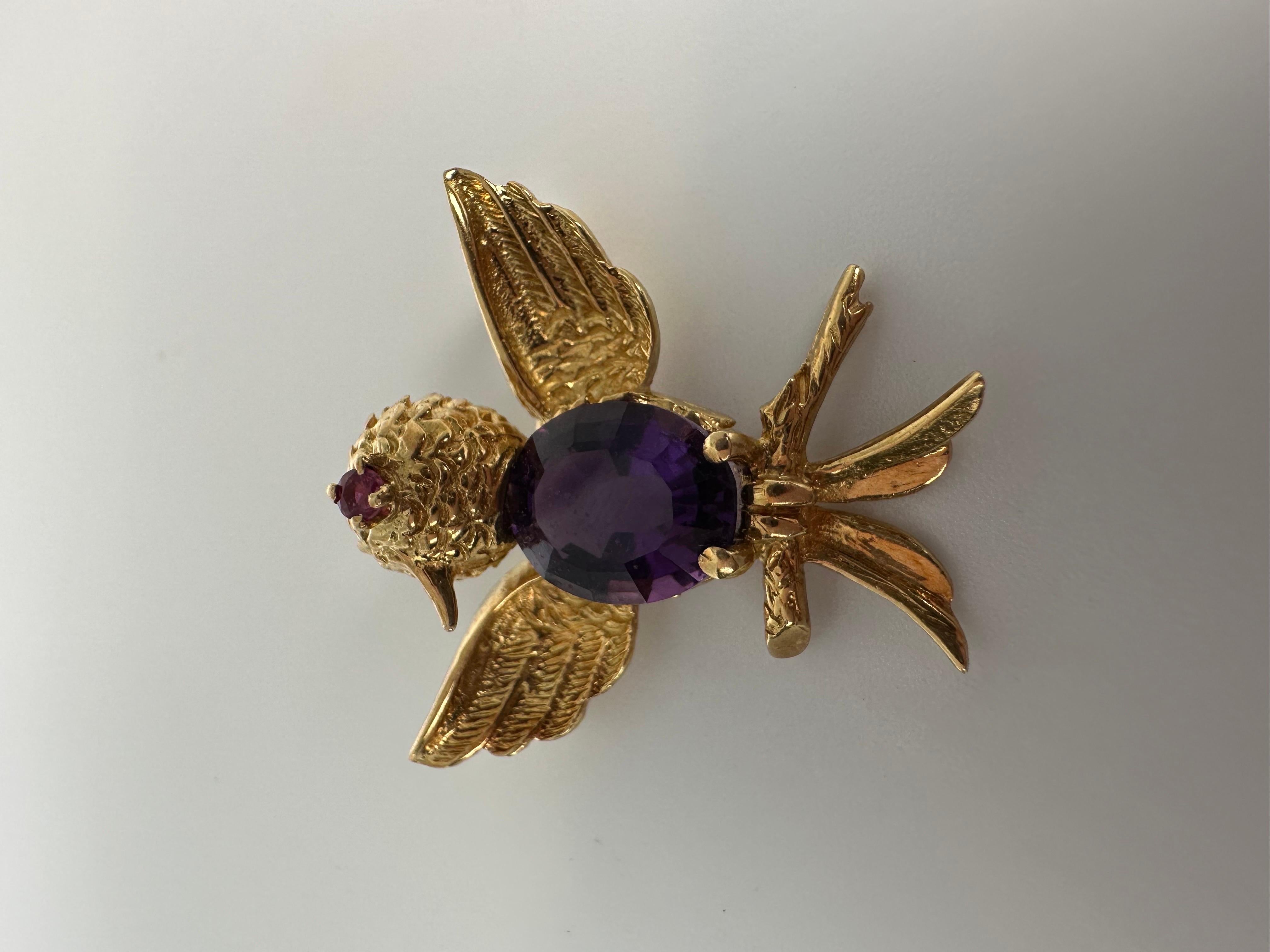 10mmx8mm amethyst in stunning brooch with a ruby eye and intricate hand design!

METAL: 18kt yellow
NATURAL AMETHYST
Clarity/Color: Slightly Included/Purple
Cut:Oval
Grams:7.09
Item18000018 kka

WHAT YOU GET AT STAMPAR JEWELERS:
Stampar Jewelers,