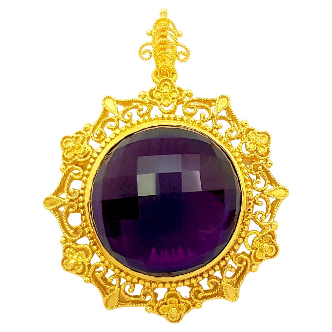 Broche/pendentif en or 18 carats sertie d'améthyste