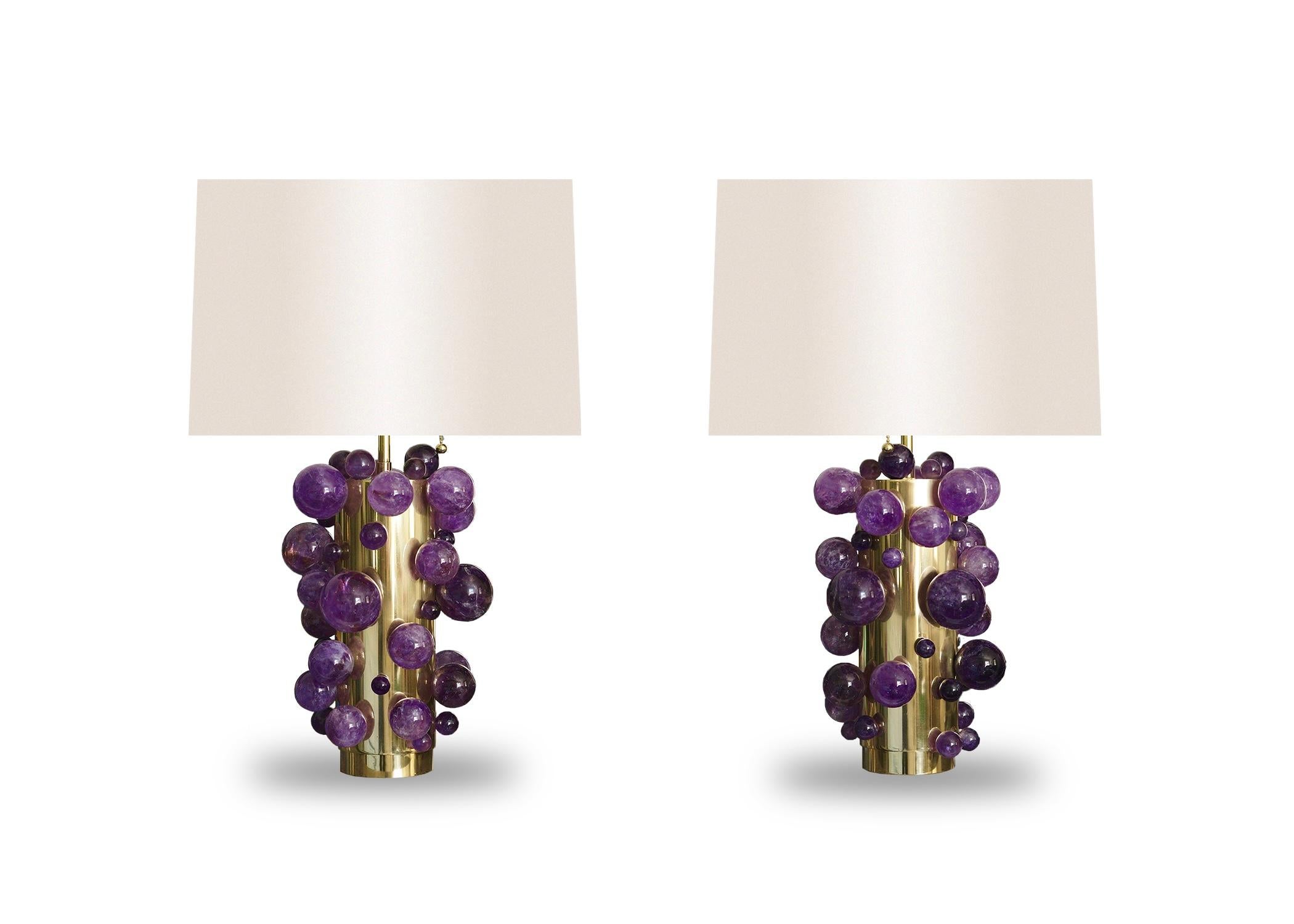 Pair of natural Amethyst bubble lamps with polished brass mounts. Created by Phoenix gallery NYC.
To the top of the rock crystal bubble: 13.5