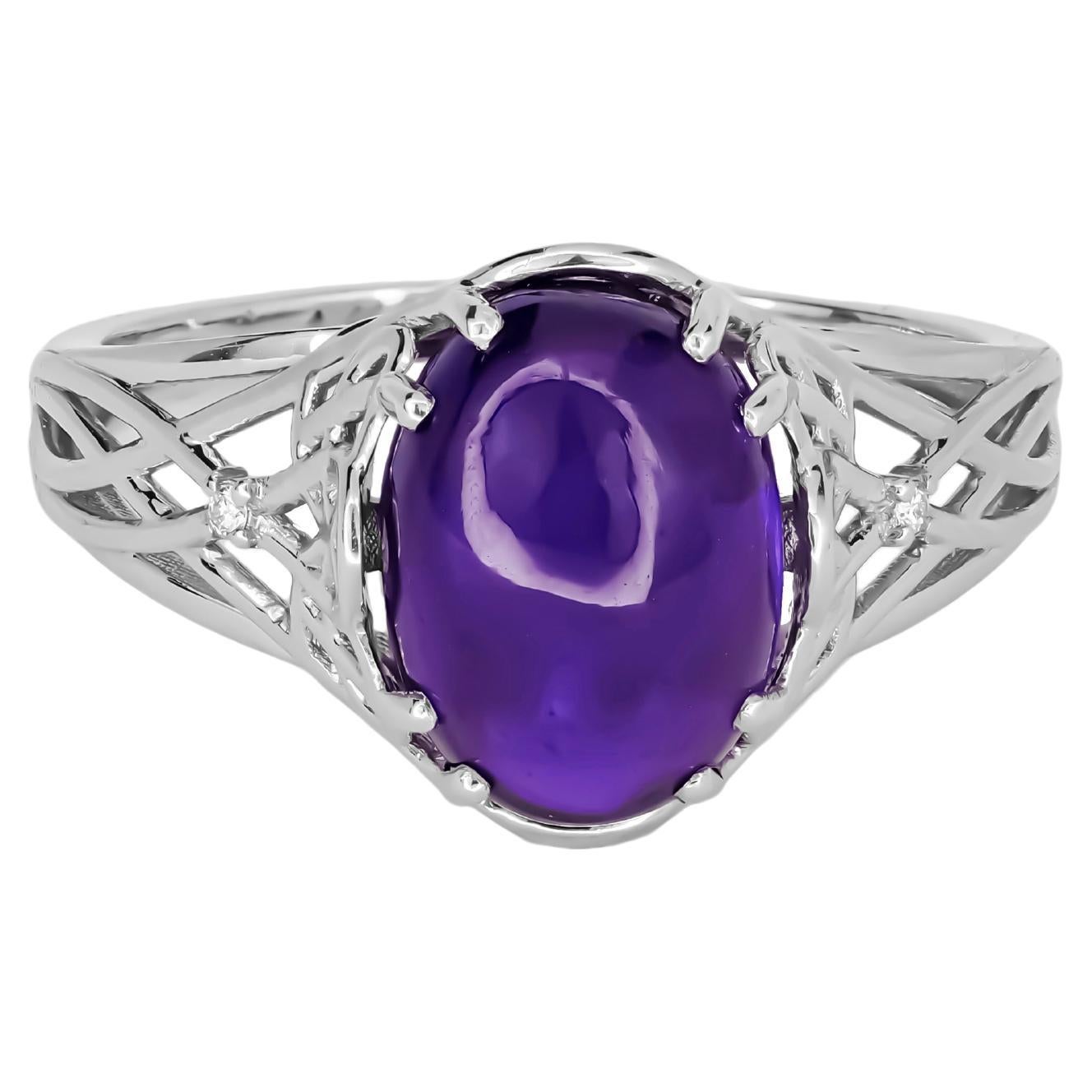 Amethyst cabochon 14k gold ring. 