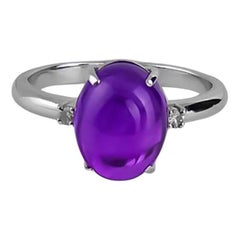 Bague en cabochon d'améthyste et diamants.