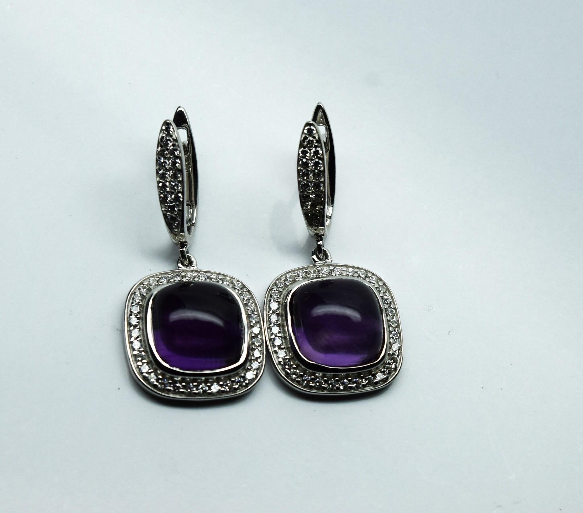 Stunning amethyst diamond earrings in 14Kt white gold, the amethyst is made with a cabochon center and accompanied by fine quality diamonds VS-SI clarity and F color.

Certificate of authenticity comes with purchase!

ABOUT US
We are a family-owned