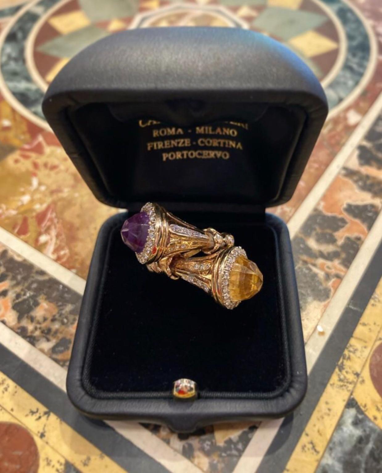 A fun vintage cocktail ring of bypass design featuring amethyst, citrine, and diamonds mounted in yellow gold. Circa 1970.
