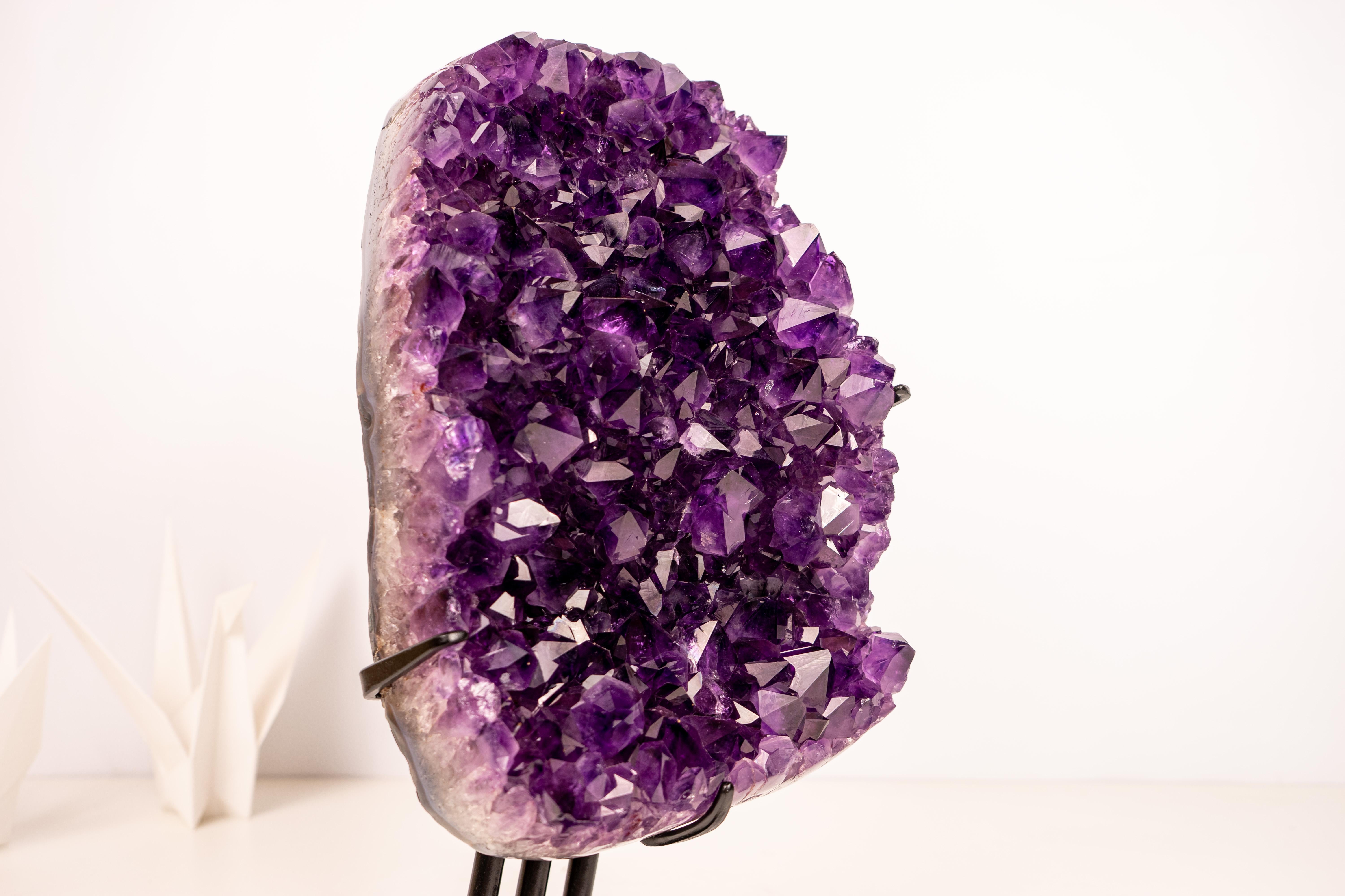 High-Grade Amethyst Cluster with Saturated Purple Amethyst Druzy: Luxurious Gemstone Display

▫️ Description

Aesthetic and sculptural, this high-grade Amethyst cluster features a deep, rich purple tone known as 