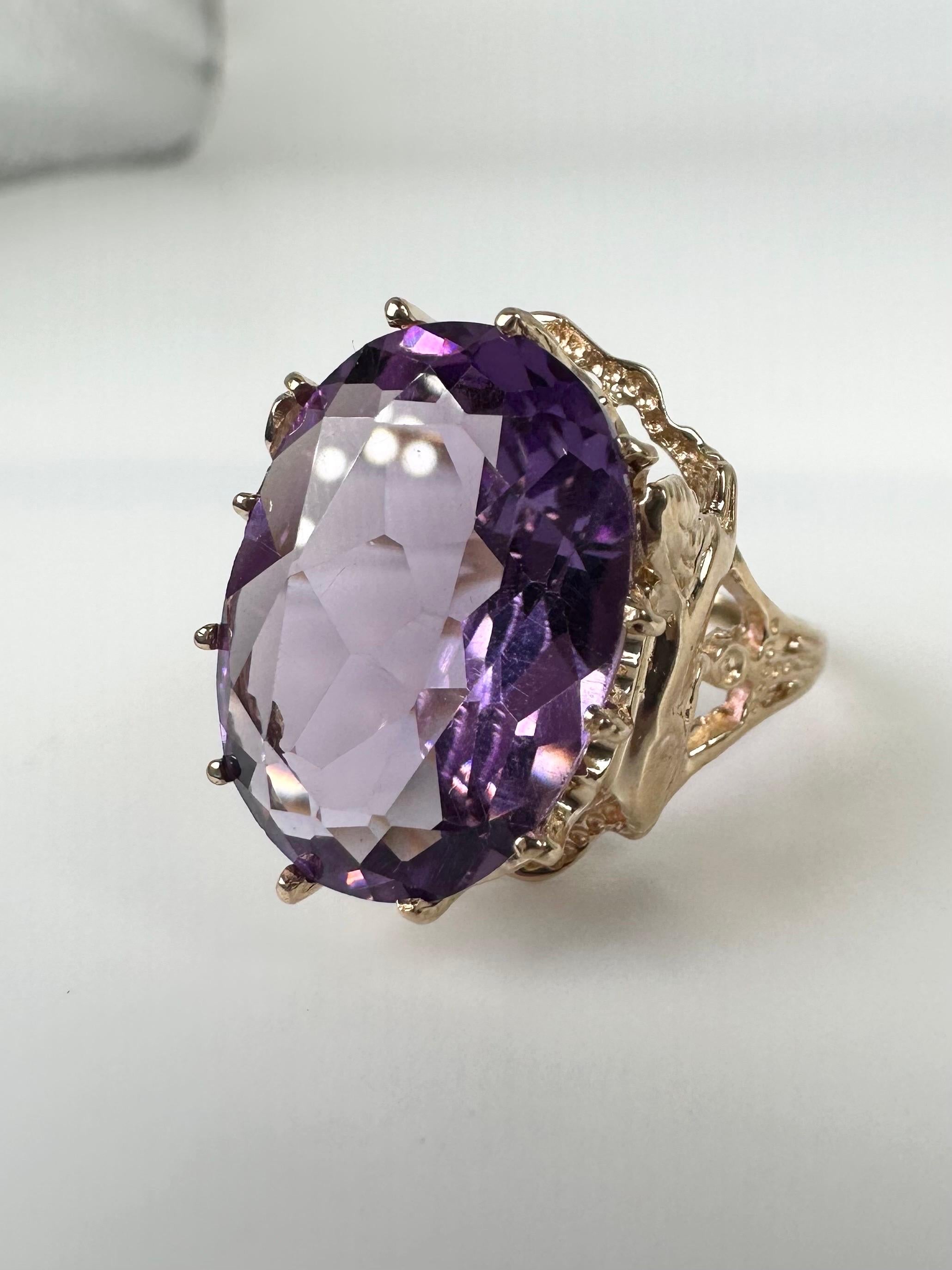 Vintage amethyst cocktail ring in 14KT yellow gold, artistically finished with one of the most brightest color amethyst. Very bright ring for a night out or a gala dinner.

GOLD: 14KT gold
NATURAL AMETHYST(S)
Clarity/Color: Slightly