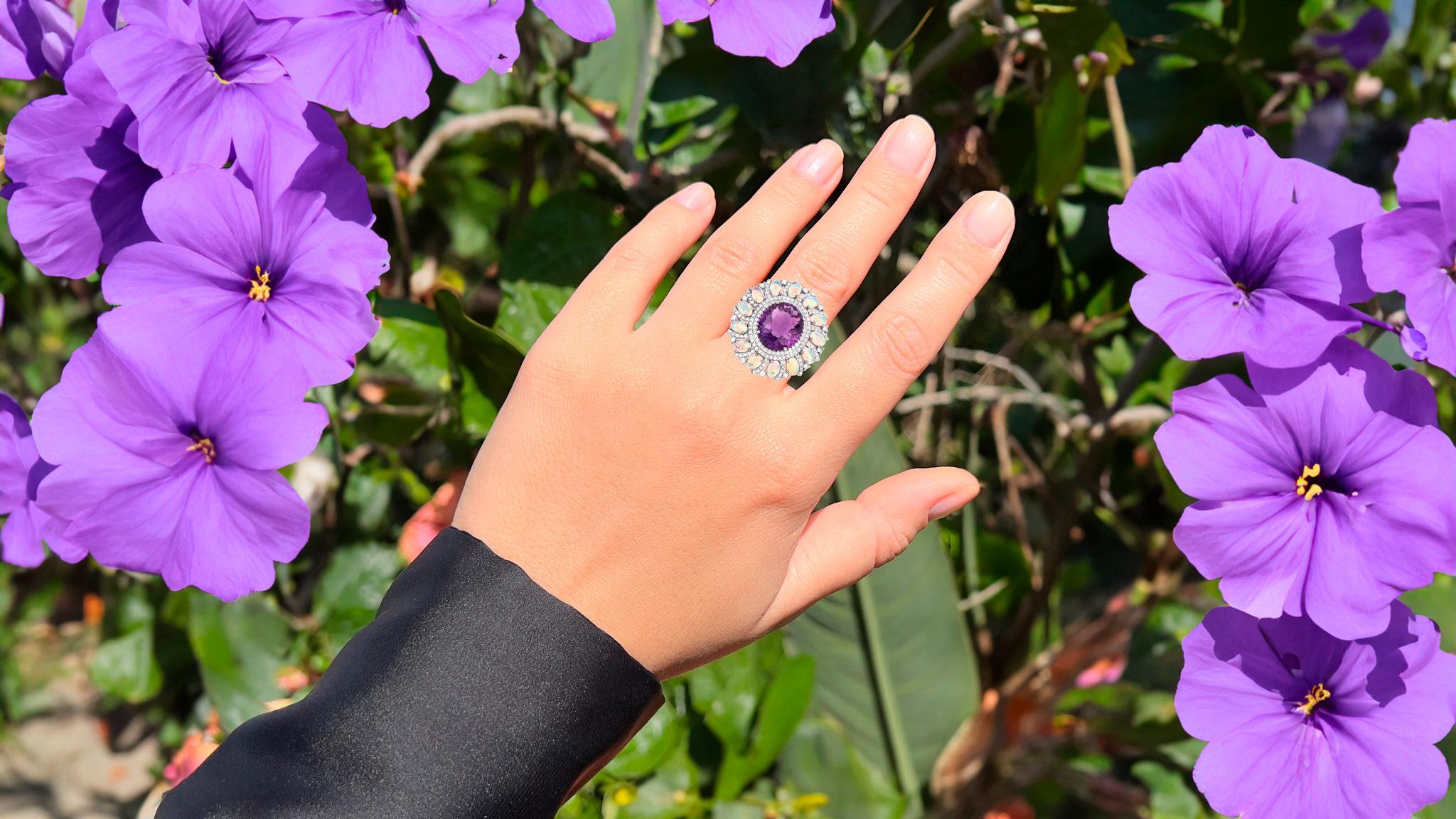 It comes with the Gemological Appraisal by GIA GG/AJP
All Gemstones are Natural
Amethyst = 11.85 Carats
13 Opals = 3.45 Carats
161 Diamonds = 1.95 Carats
Metal: Black Rhodium Plated Sterling Silver
Ring Size: 7* US
*It can be resized complimentary