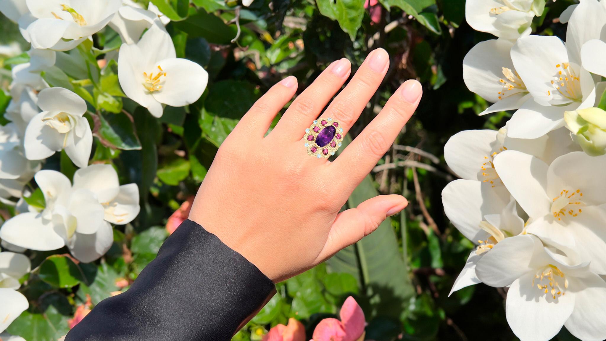 It comes with the Gemological Appraisal by GIA GG/AJP
All Gemstones are Natural
Amethyst = 6.80 Carat
Rhodolite Garnets = 1.70 Carats
Blue Topazes = 0.60 Carats
Metal: 14K Yellow Gold Plated Sterling Silver
Ring Size: 8* US
*It can be resized