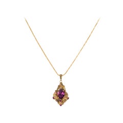Amethyst coloured pendant with chain