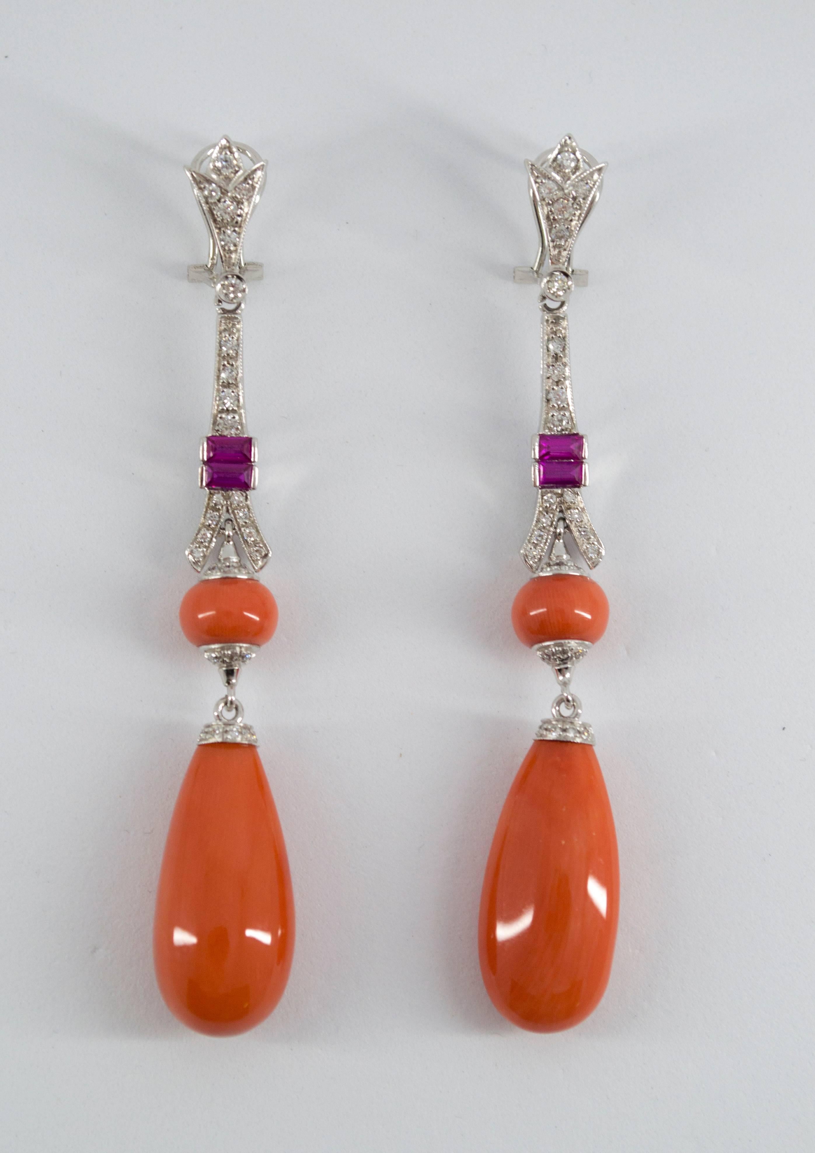 These Clip-On Earrings are made of 9K White Gold.
These Earrings have 0.90 Carats of White Diamonds.
These Earrings have Red Coral and Amethyst.
All our Earrings have pins for pierced ears but we can change the closure and make any of our Earrings