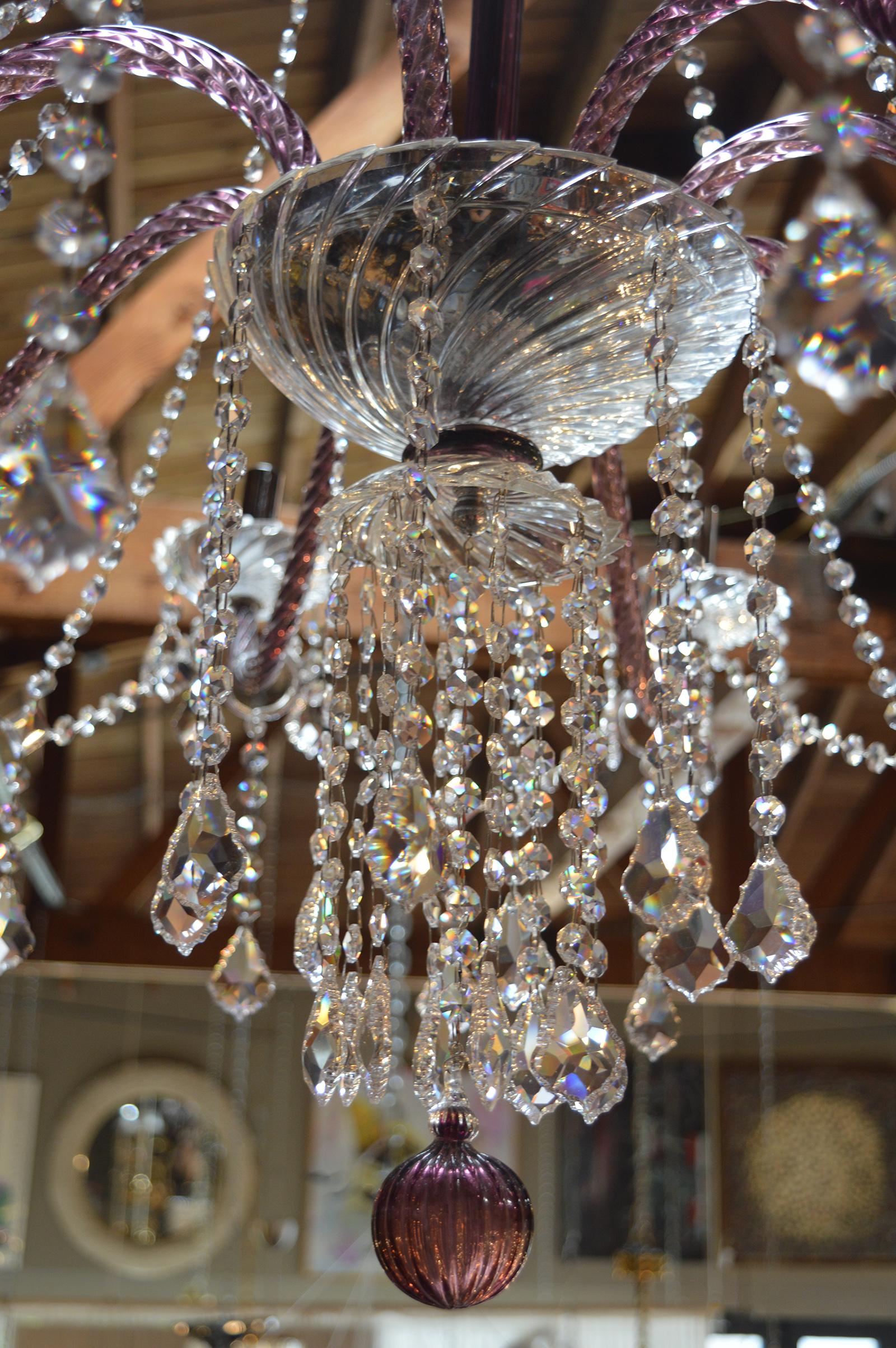 Purple Murano chandelier with crystals.