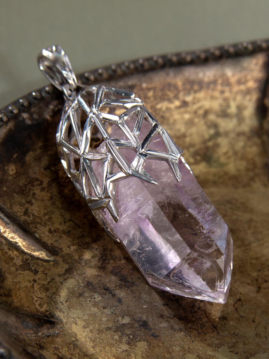 Silver pendant with natural Amethyst crystal of 78 carats
amethyst original - Brandberg, Namibia
crystal measurements - 0.87 x 1.57 in / 22 х 40 mm
pendant weight - 24 grams
pendant height - 2.28 in / 58 mm


We ship our jewelry worldwide – for our