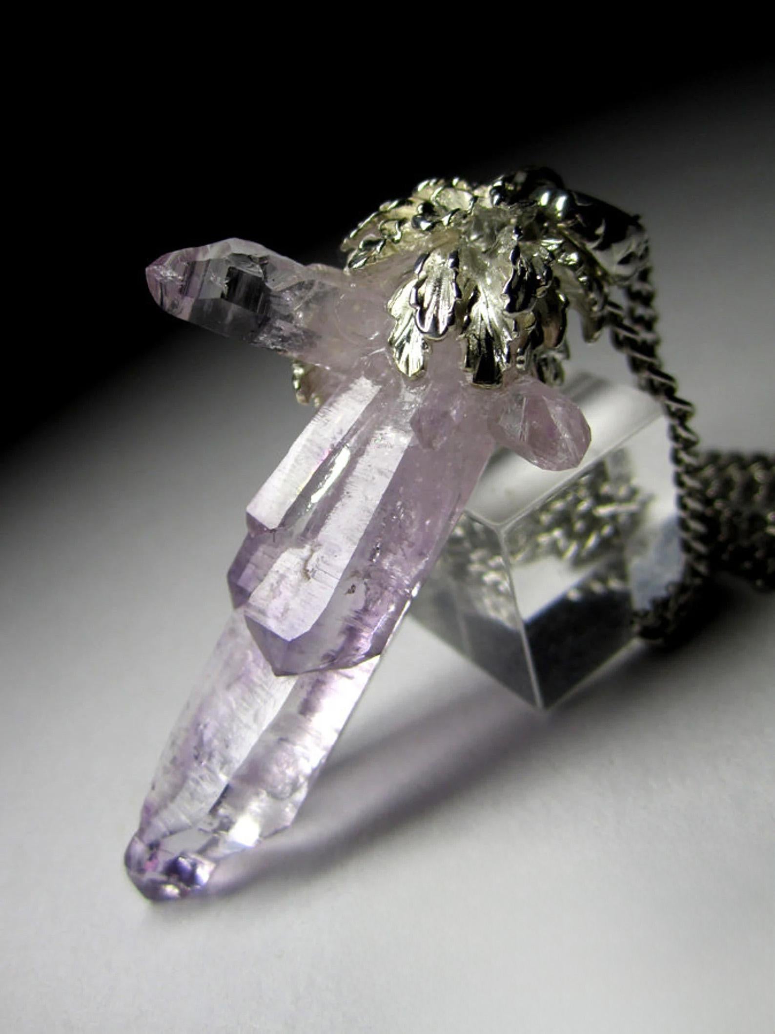 Stylish silver pendant with natural сrystals of Amethyst  
crystal origin - Mexico
crystal weight - 28 carat
pendant weight - 11.6 grams 
pendant height - 2.13 in / 54 mm
pendant size - 0.63 x 0.71 х 2.05 in / 16 х 18 х 52 mm
