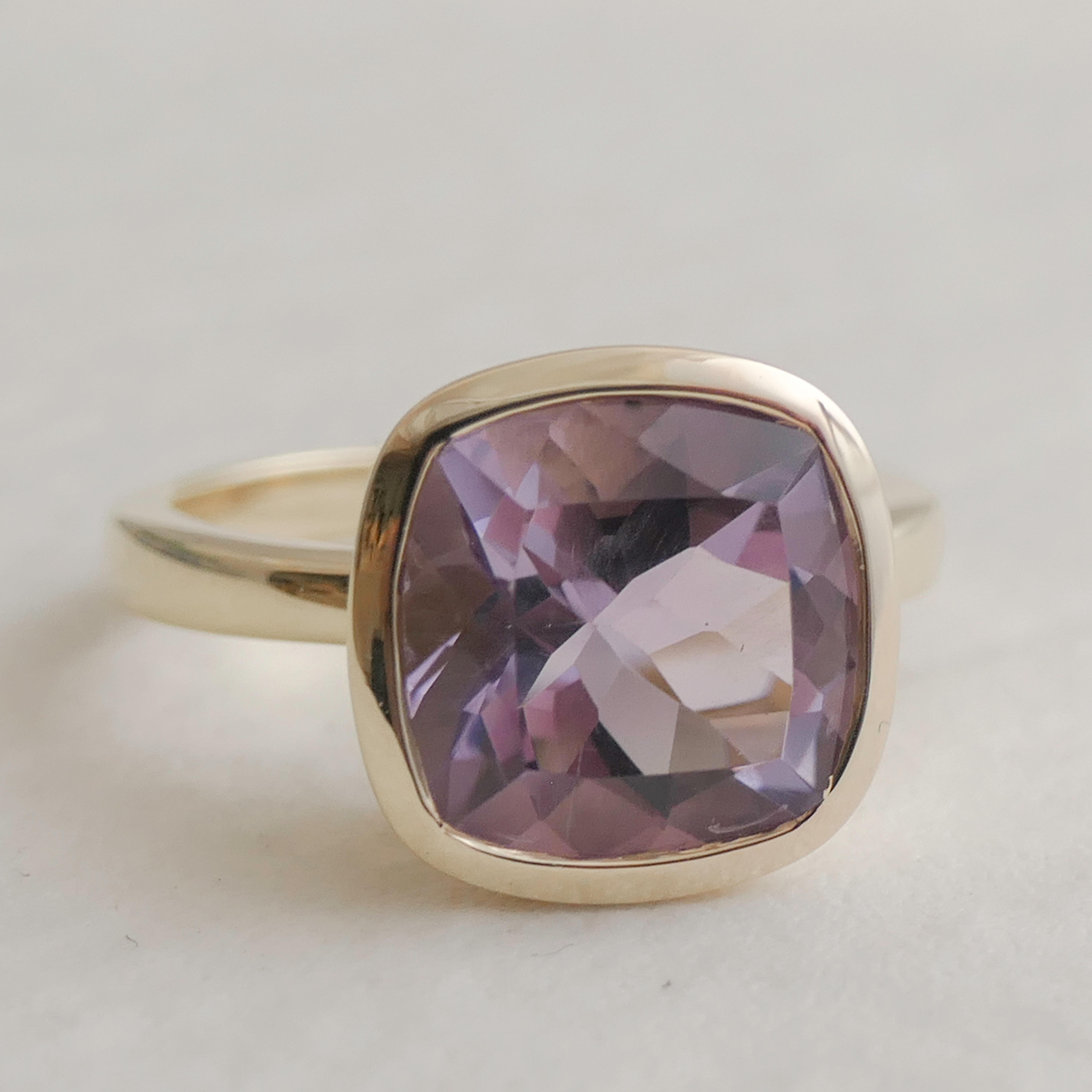 10x10mm Cushion Cut Faceted Amethyst is set in gold-plated 925 sterling silver.
Available in sizes 6, 7, 8 and 9.  Please let me know what size you want when you order.