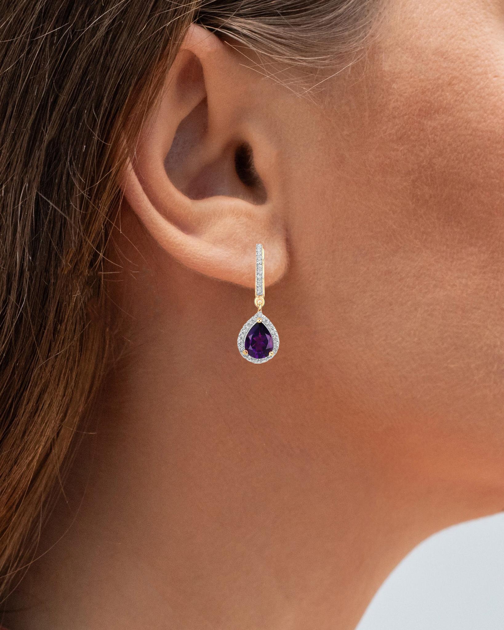 It comes with the Gemological Appraisal by GIA GG/AJP
All gemstones are natural
2 Amethysts = 2.00 Carats
72 White Topaz = 0.28 Carats
Metal: 18K Yellow Gold Plated Sterling Silver
Dimensions: 25 x 9 mm