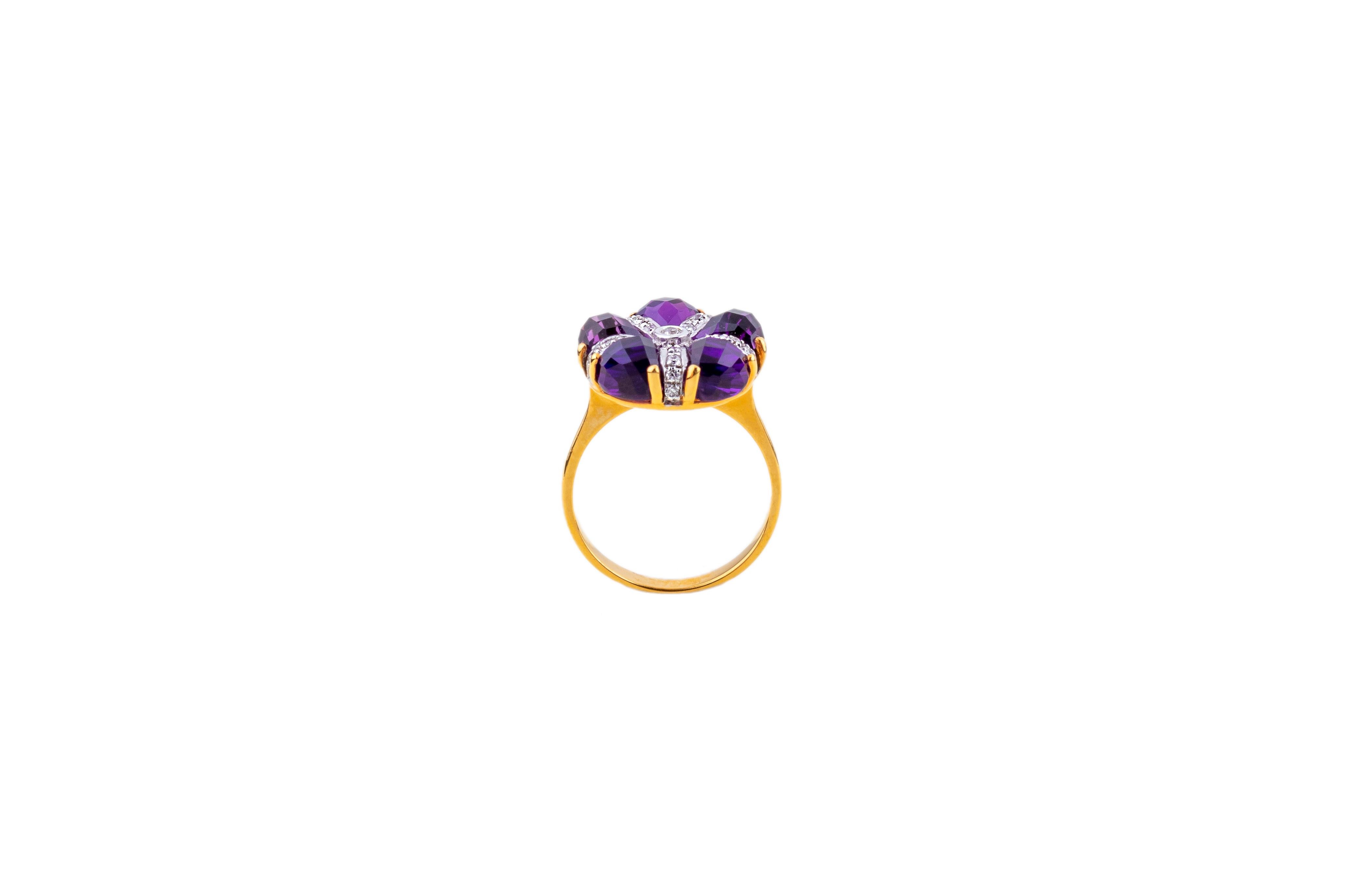 14k gold
punched 14k
5,60ct Amethysts
0,20ct diamonds
Ring size : 12/52