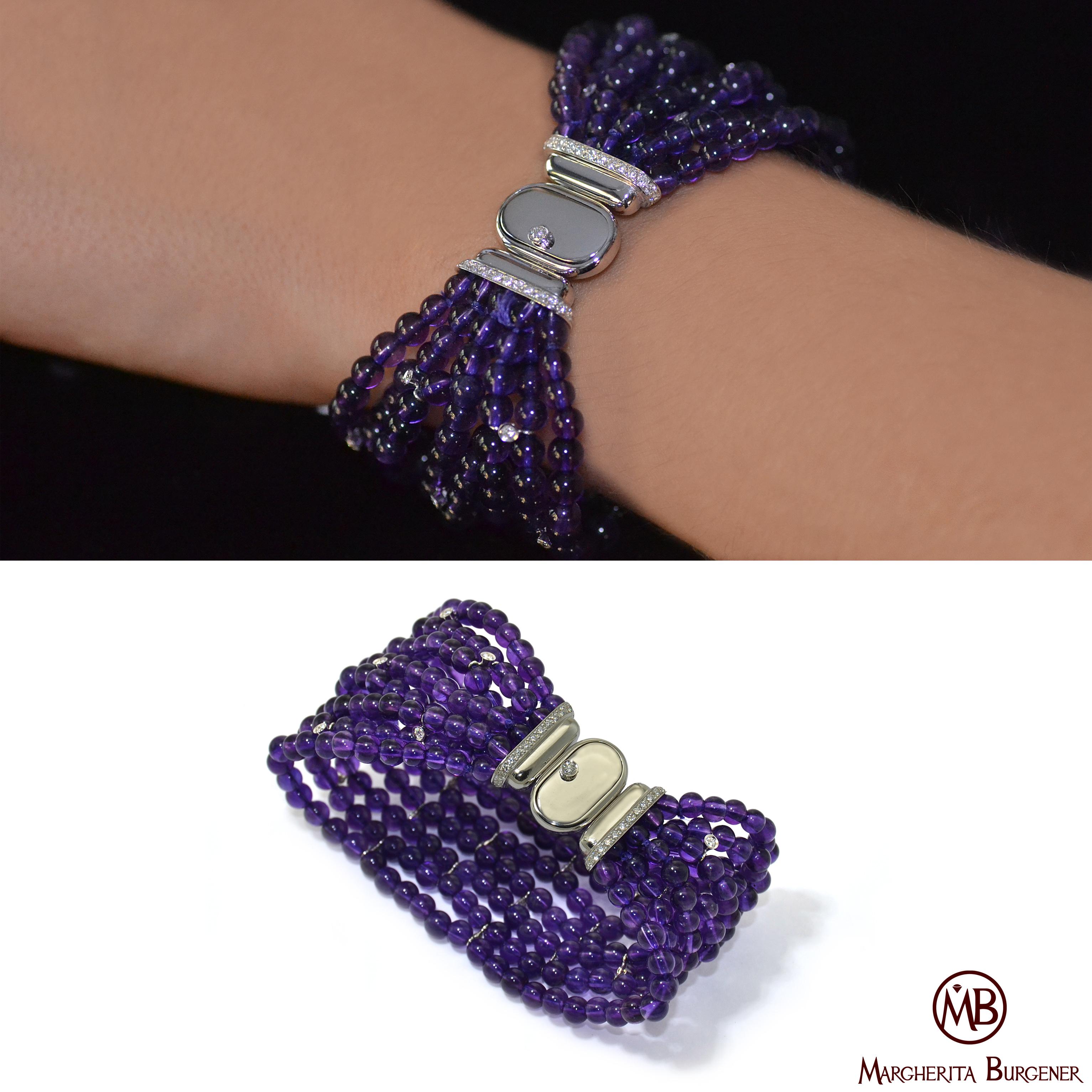 Flexible bracelet handcrafted in Margherita Burgener workshop, Italy.
Very chic and comfortable.
8 little balls strands of amethyst are highlighted by single diamonds, bezel set on white gold. 

18 KT white gold grams 11.30 
n. 67 diamond  total ct 