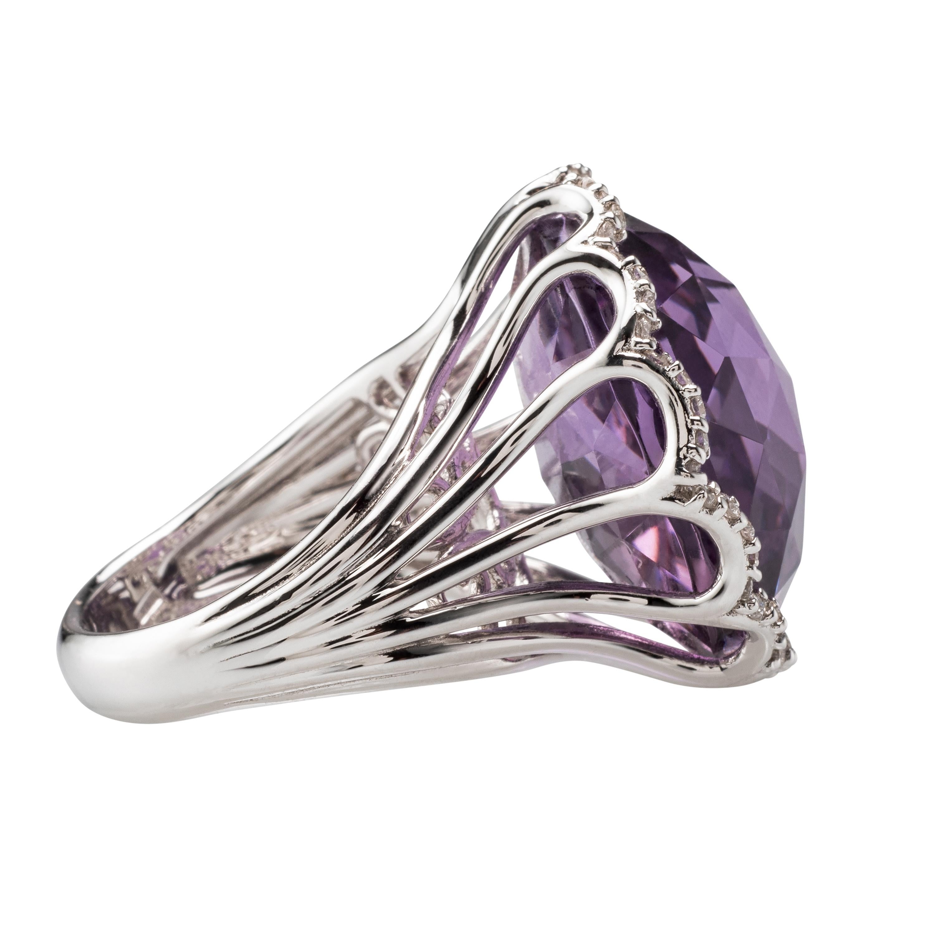 Modern Cut Amethyst and Diamond Cocktail Ring. This Cocktail Ring is truly an impressive piece of jewellery. Produced in Italy, with attention to a very small detail.
30 Carat Amethyst and 0.51 Carat Diamonds set in 18 Karat White
