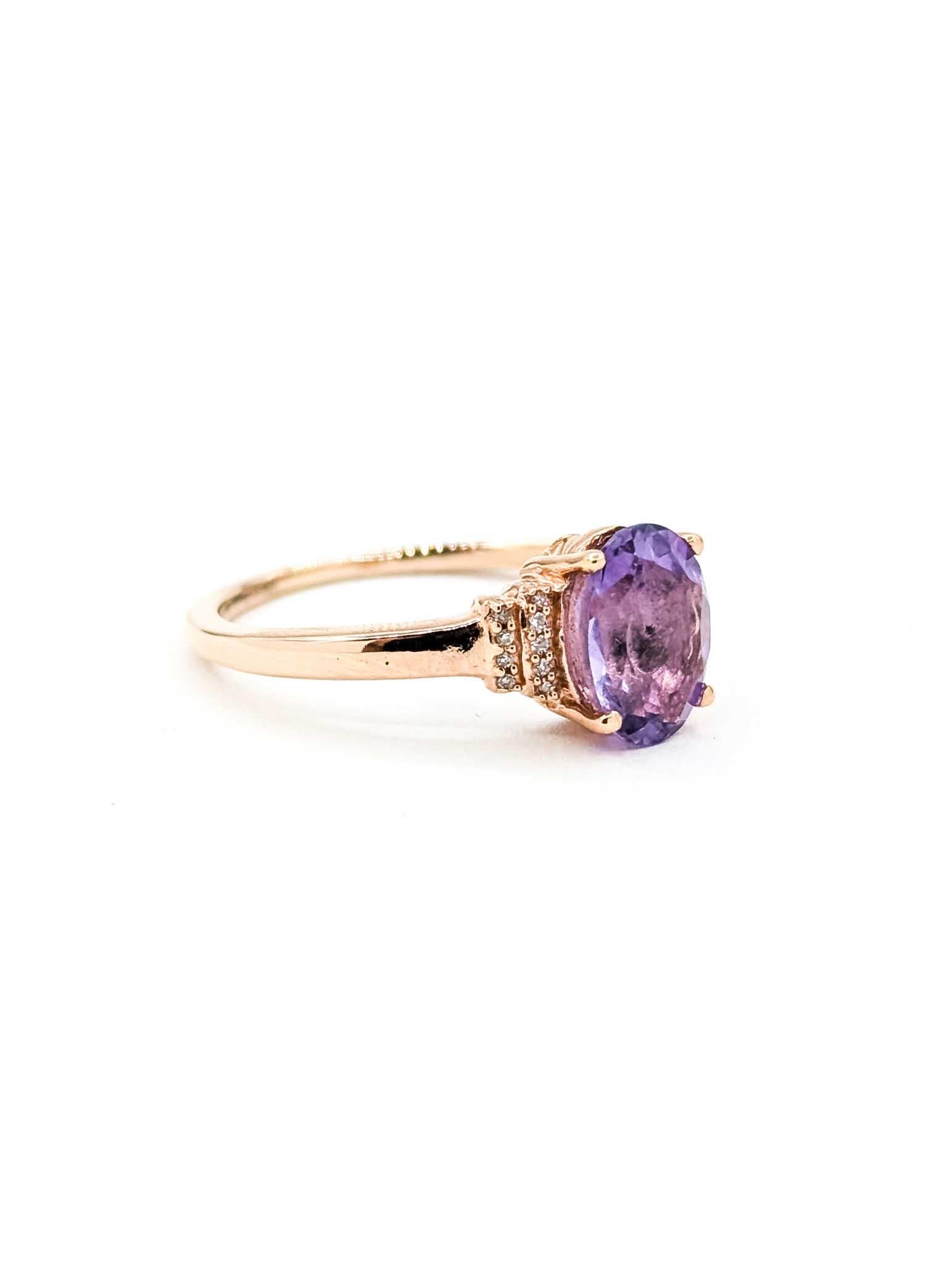 Amethyst & Diamond Accented Ring in 10k Rose Gold

This ring is crafted in 10k rose gold and features prong-set purple amethyst, with an accented design. The amethyst weighs 1.7ct. The round diamonds total 0.05ctw, near colorless with I clarity.