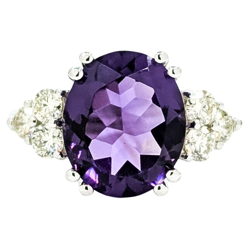 Bague en or blanc 14k ornée d'améthystes et de diamants