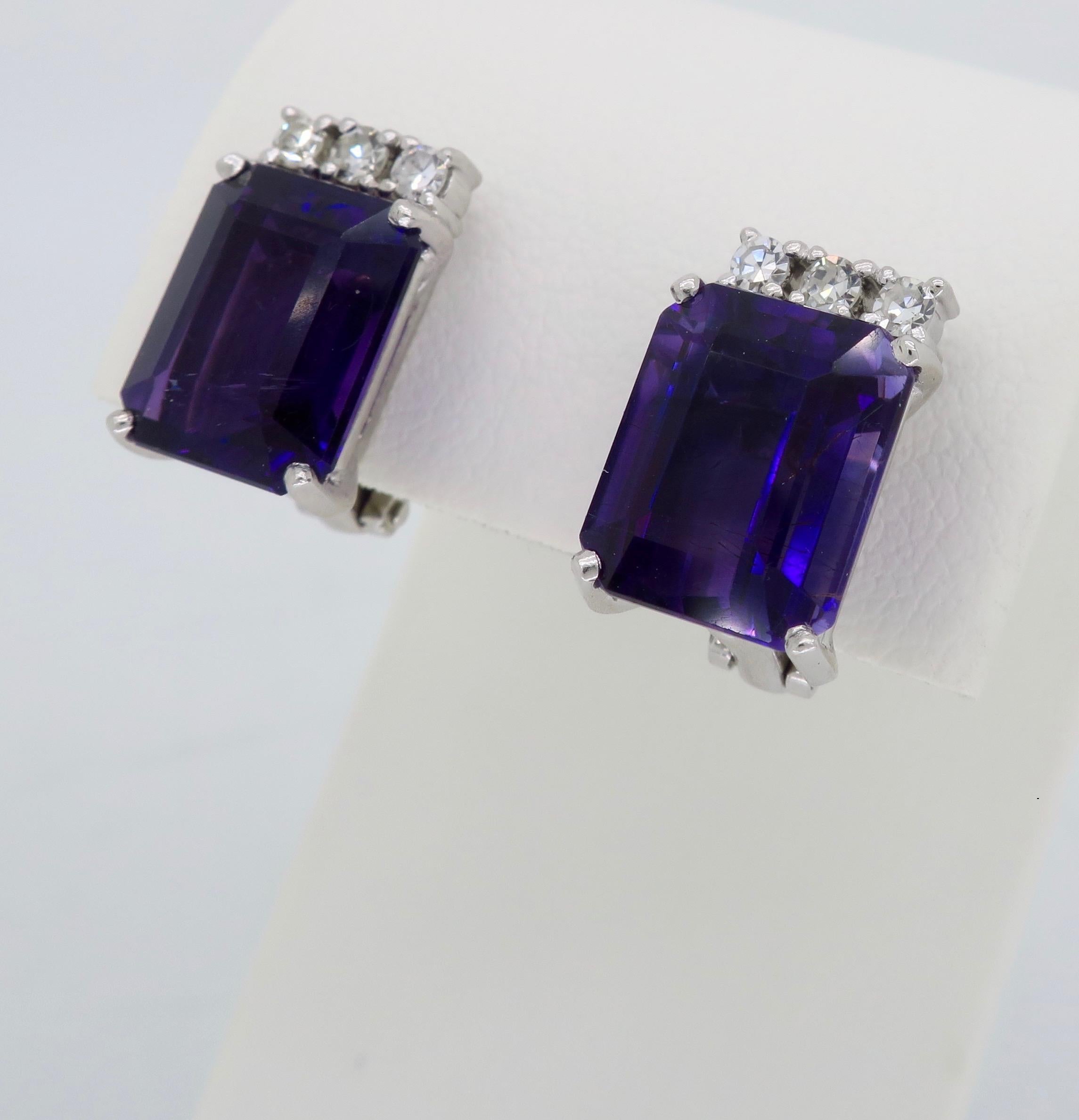 Vintage Amethyst and Diamond clip on style earrings.

Gemstone: Amethyst & Diamond
Gemstone Carat Weight: Two Approximately 11x9mm Amethyst 
Diamond Carat Weight:  Approximately .21CTW
Diamond Cut: Single Cut
Color: Average G-I
Clarity: Average