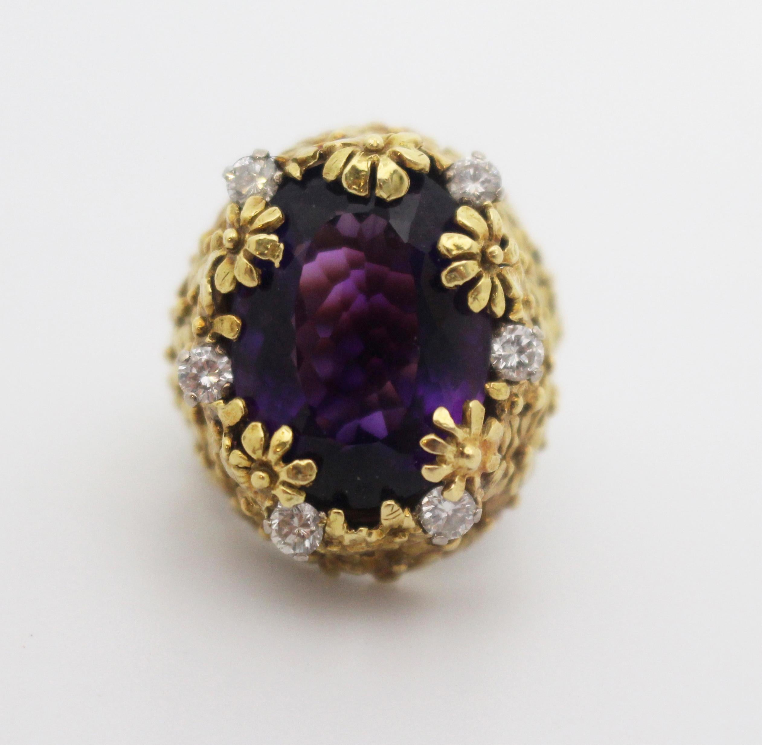 Amethyst & diamond fancy openwork flower ring


Centring on an oval shaped mixed cut amethyst. Weight 15.75 carat, deep purplish mauve in colour, minimal inclusions

Six four claw set round brilliant cut diamonds. Total diamond weight 0.66