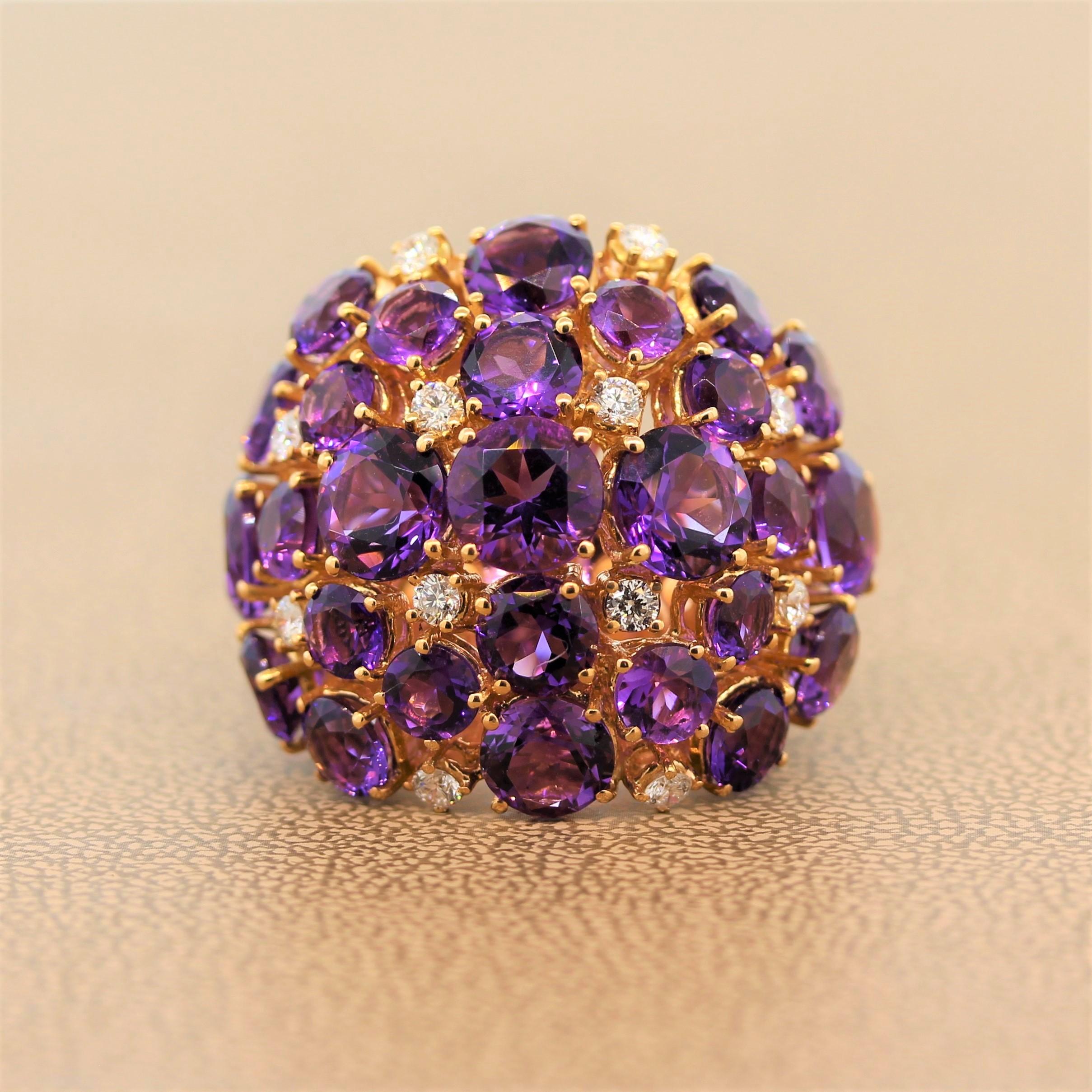 A marvelous domed cocktail ring featuring 15.94 carats of vivid purple amethyst. The round cut gems are clustered with 0.63 carats of VS quality diamonds in an 18K rose gold setting.

Ring Size 6.75 (Sizable)
