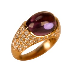 Anello cocktail in oro con diamante e ametista