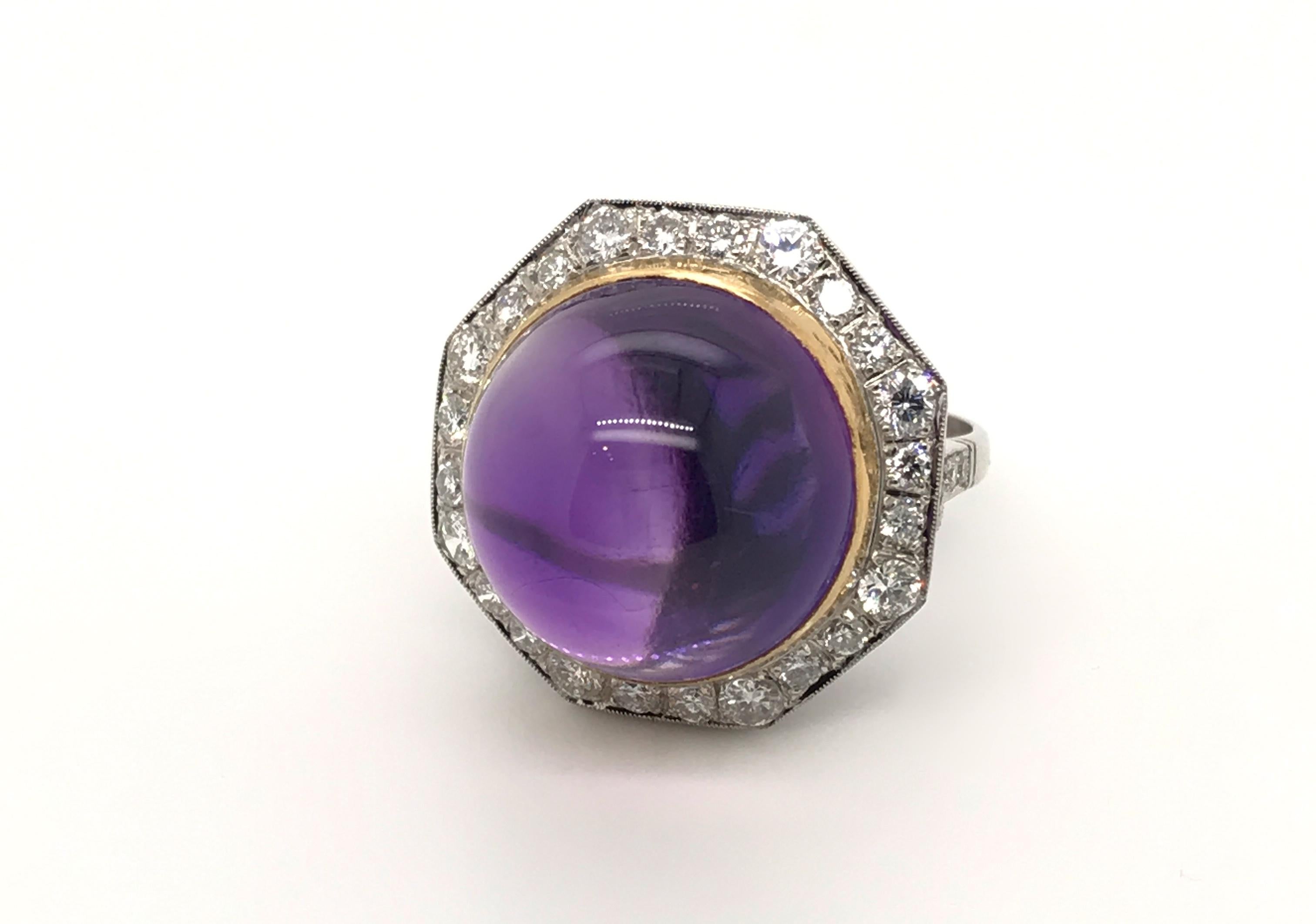 The showstopper of all rings! I would have to say this is one of the largest cocktail rings have ever had in my collection, so if you are looking for a BIG eye-catching ring with an amazing colourful gemstone, this could be it! A cabochon cut deep