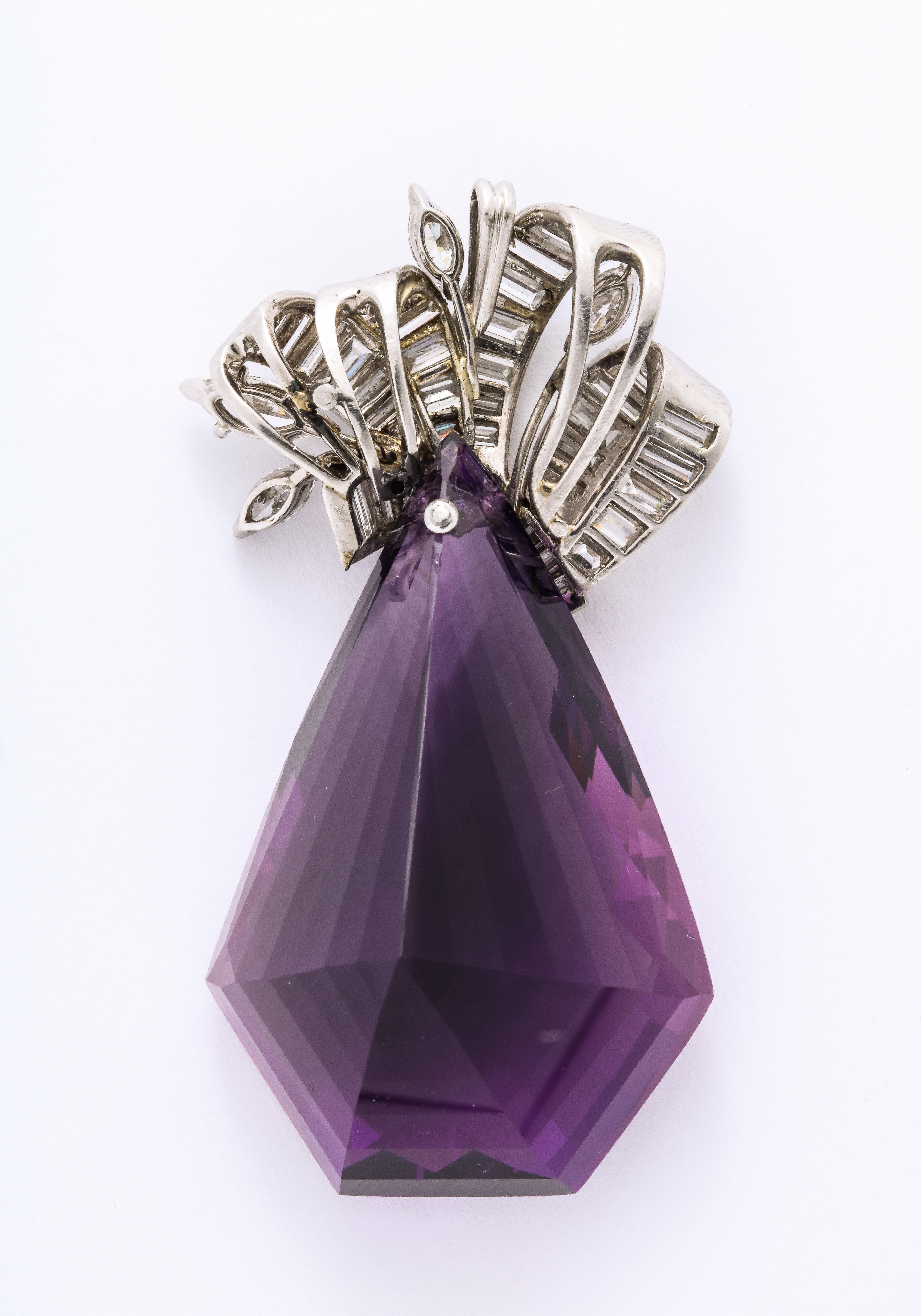 Amethyst Diamond Platinum Slide Pendant. The amethyst measures 39 cts and the Platinum is unmarked but tested. Circa 1940.

Materials:
Platinum, 21.9 dwt

Stones:
Diamonds: 5.80 cts TW
Trapezoid Amethyst 39 cts