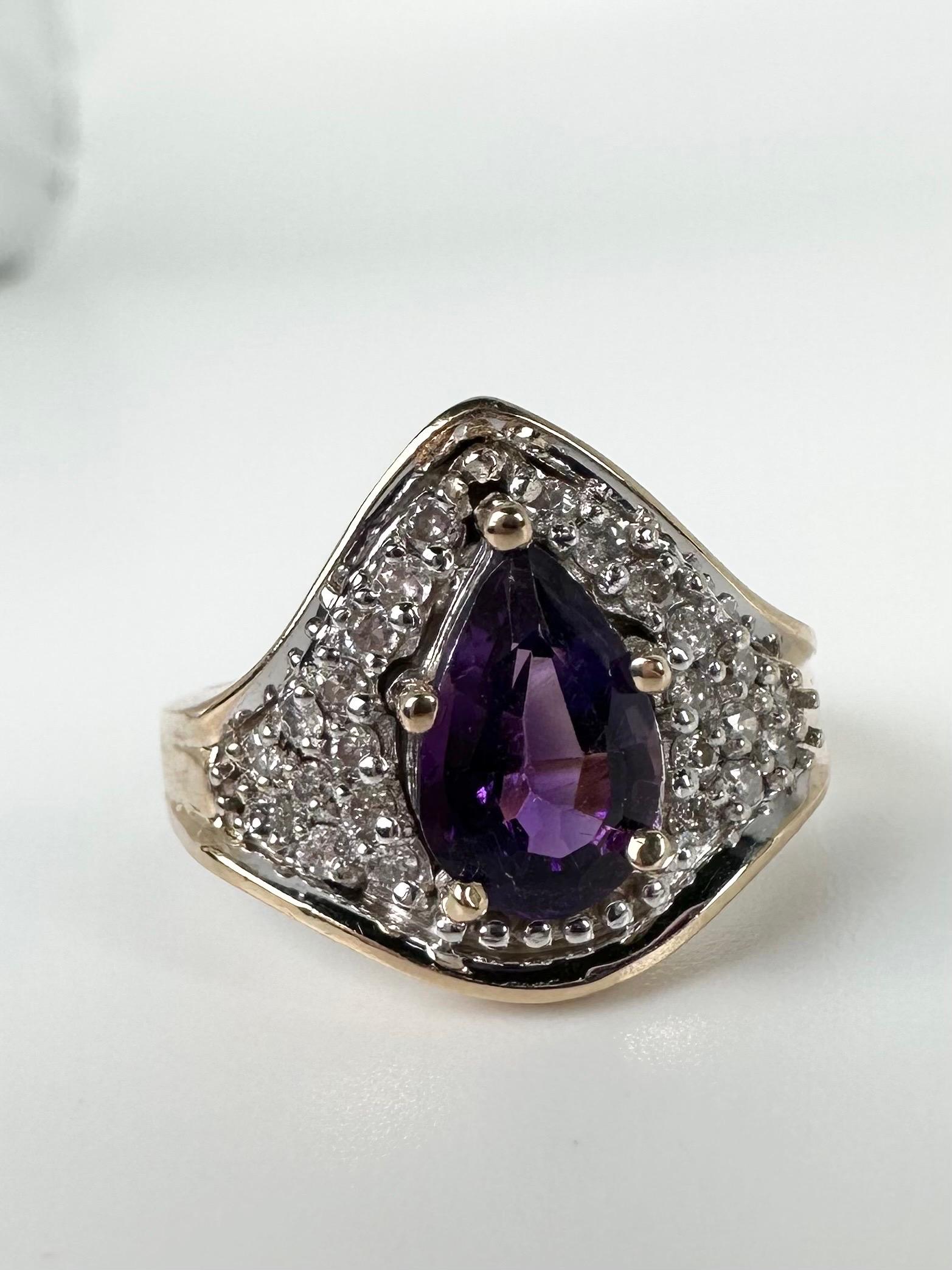 Pave set cocktail ring made in 14KT yellow gold with stunning amethyst and natural diamonds.

GOLD: 14KT gold
NATURAL DIAMOND(S)
Clarity/Color: SI/H
Carat:0.24ct
Cut:Round Brilliant
NATURAL AMETHYST(S)
Clarity/Color: Slightly