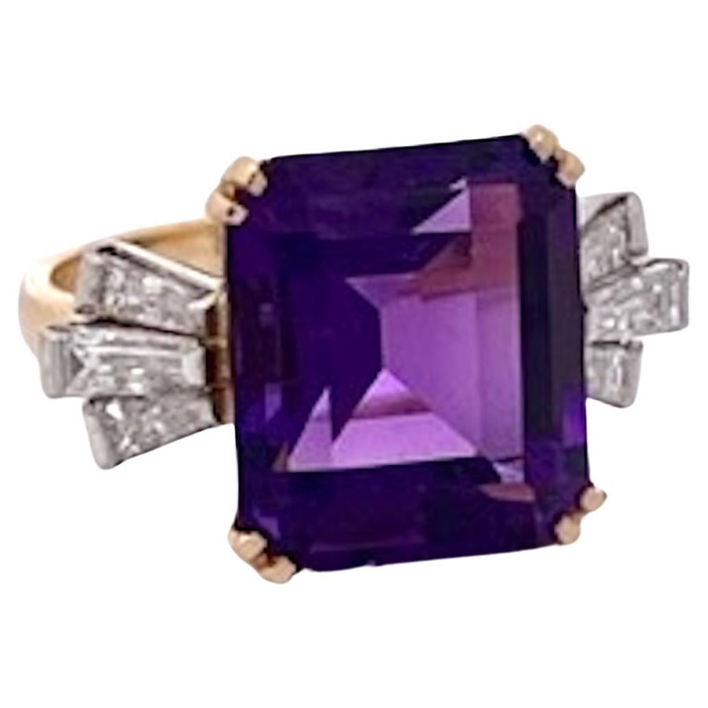 This gorgeous Amethyst Diamond Ring is set in 18K Yellow Gold.  It is set with six (6) baguette Diamonds at approximately 0.25 points each for a total carat weight of 1.50 carats.  The Amethyst is large approximately 8 to 10 carats and a beautiful