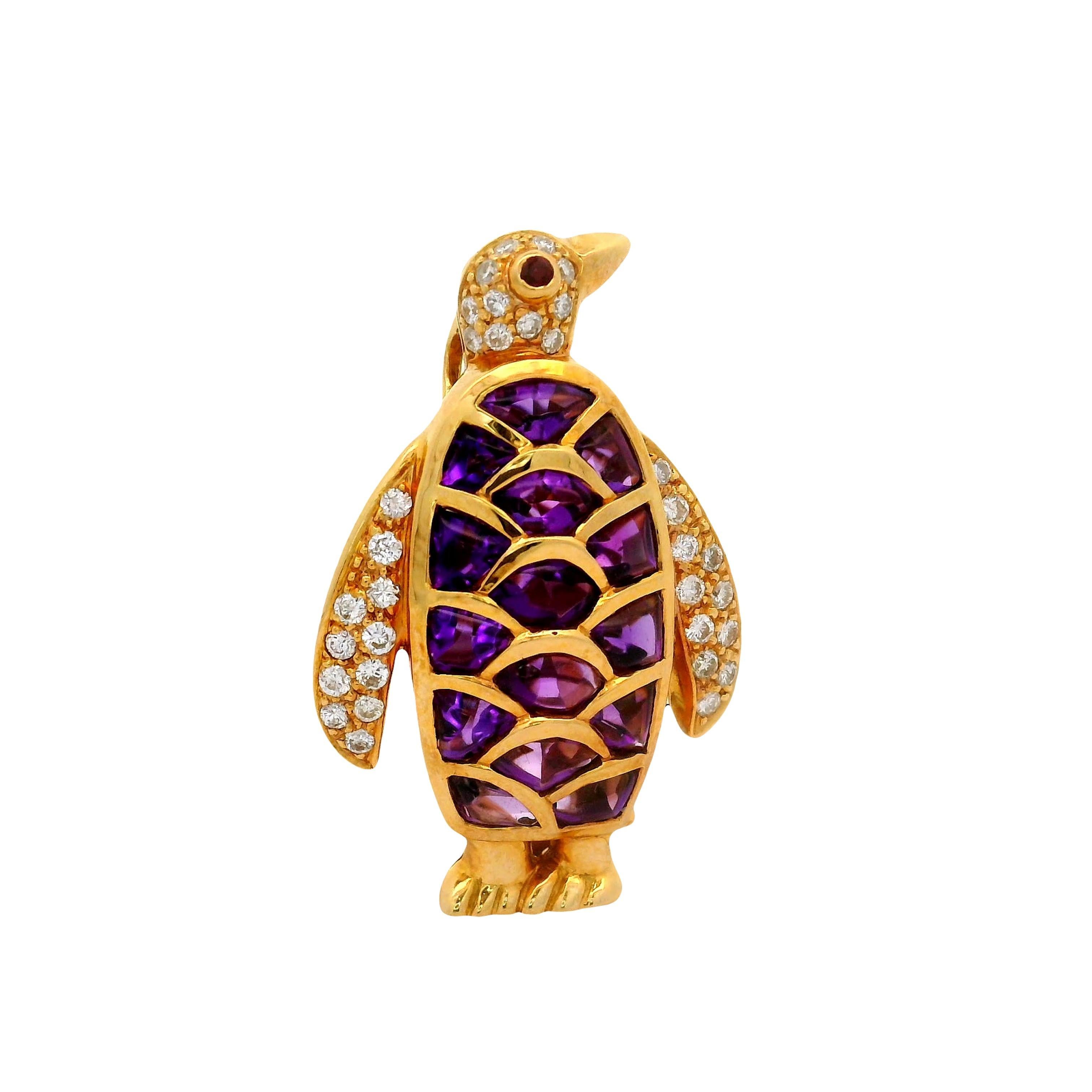 A captivating brooch meticulously designed in the shape of a penguin, adorned with fancy-shape amethysts and round diamonds. The body features vibrant purple amethysts, weighing 2.65 carats, expertly bezel-set to form the body of the penguin. The