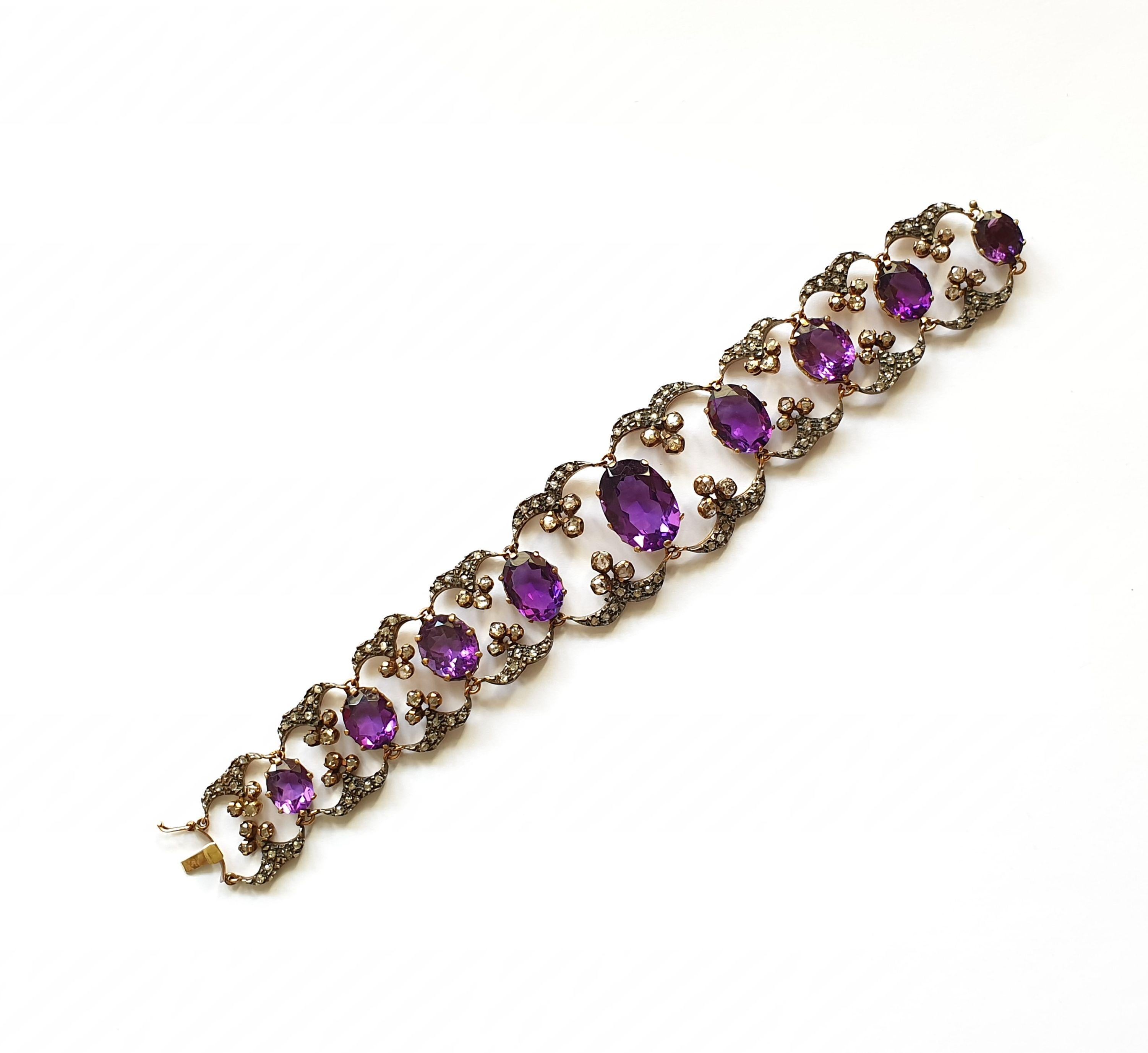 Set with 9 oval shape graduating fine amethysts weighing totally circa 42,5 ct. and filigree flexible arch links, set with 152 rose-cut diamonds weighing total circa 4,20 ct. SI-P, wesselton to top cape. Mounted in silver, 9K and respectively 18K