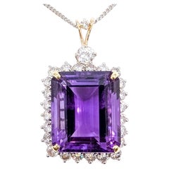 Pendentif imposant en améthyste et diamants, en or bicolore 14 carats