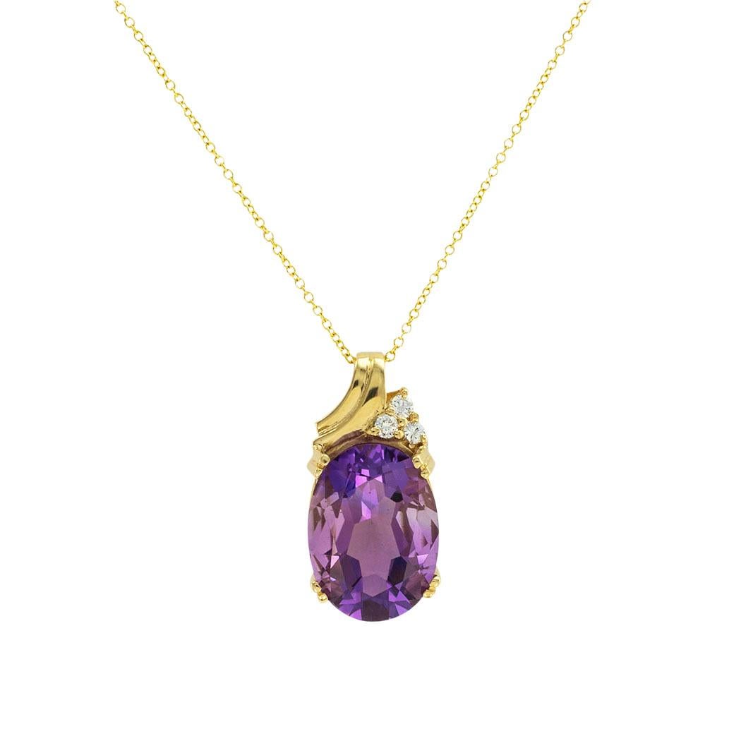 Amethyst and diamond yellow gold pendant circa 2000. *

ABOUT THIS ITEM:  #P5041 Scroll down for specifications.  Showcasing a large amethyst displaying very pleasing color and brightness accented by a trio of diamonds.  This is a more contemporary