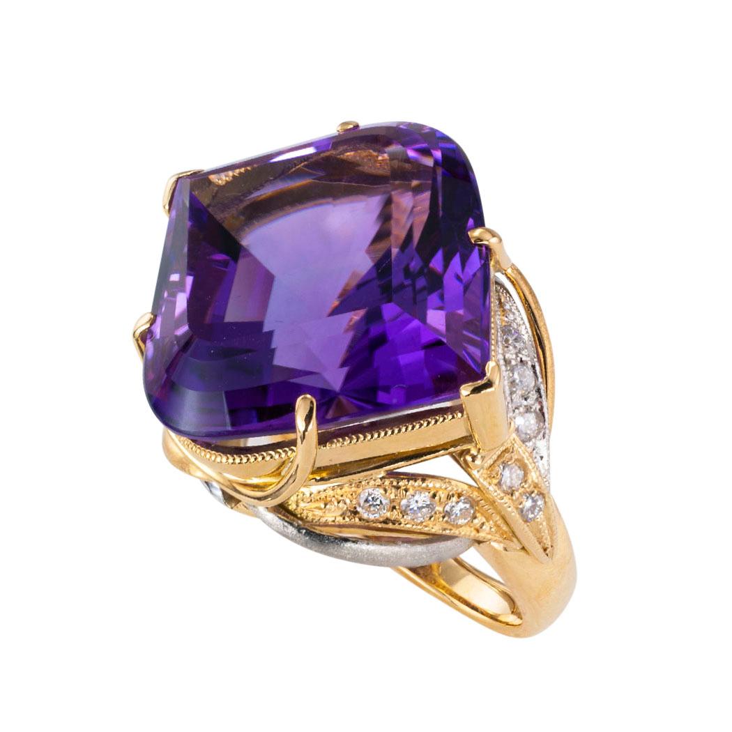 Amethyst diamond platinum and yellow gold cocktail ring circa 1990.  Clear and concise information you want to know is listed below.  Contact us right away if you have additional questions.  We are here to connect you with beautiful and affordable