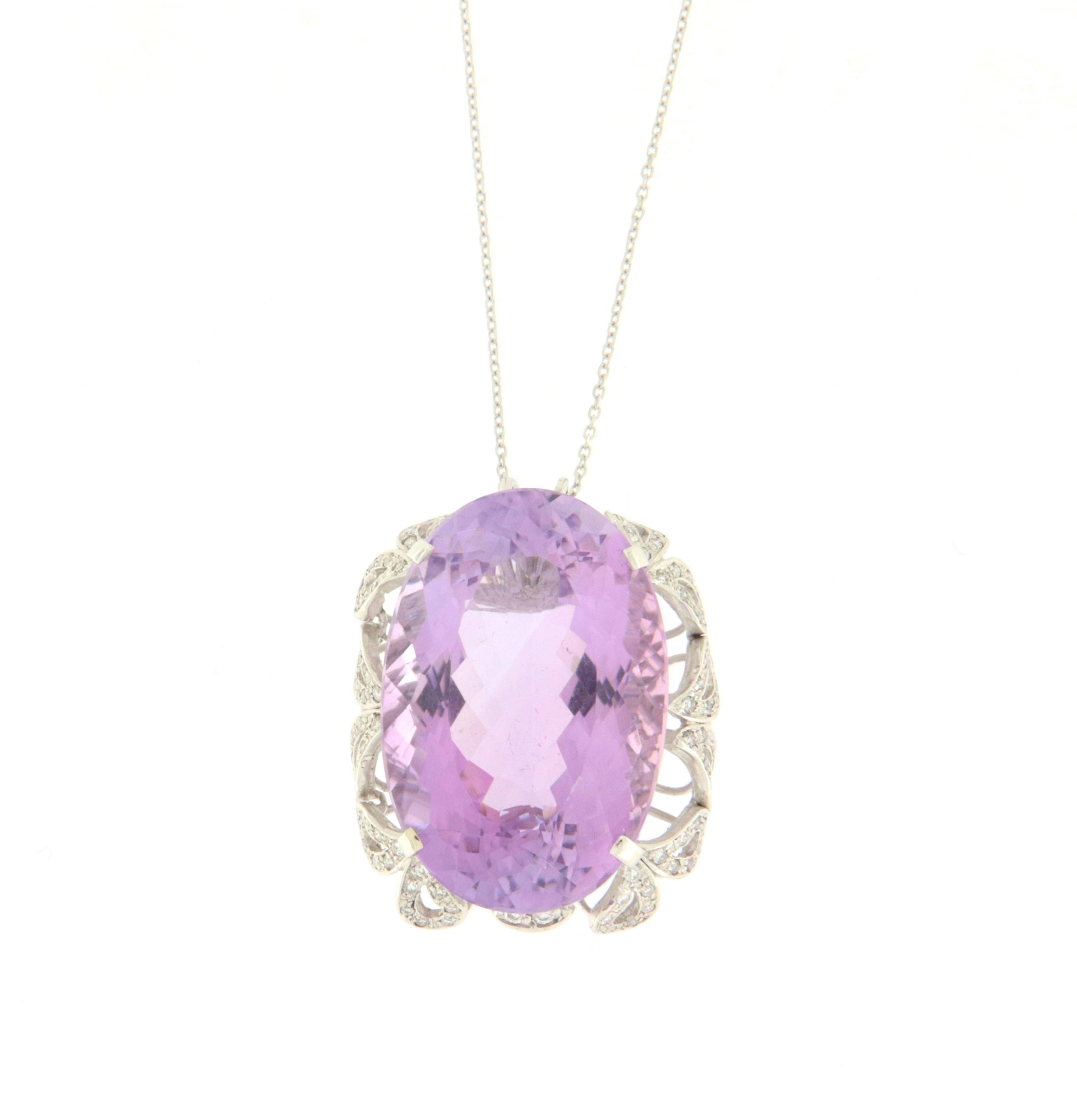 18 karat white gold pendant necklace. Handmade by our artisans assembled with amethyst and diamonds.

Pendant total weight 16.90 grams
Diamonds weight 1.40 karat
Amethyst weight 42.42 karat
Chain length 45 cm
