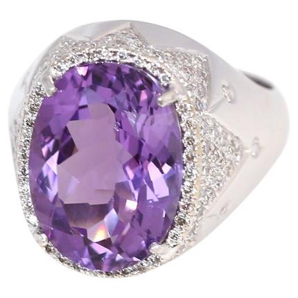 Amethyst and Diamonds Modern Frozen Ring White Gold 18 Karat. 
Absolutely unique purplish color of the Amethyst, clear and fine cut. White Gold and Diamonds underline the beauty of the main stone, shining as if frozen on the finger. 
Being of a