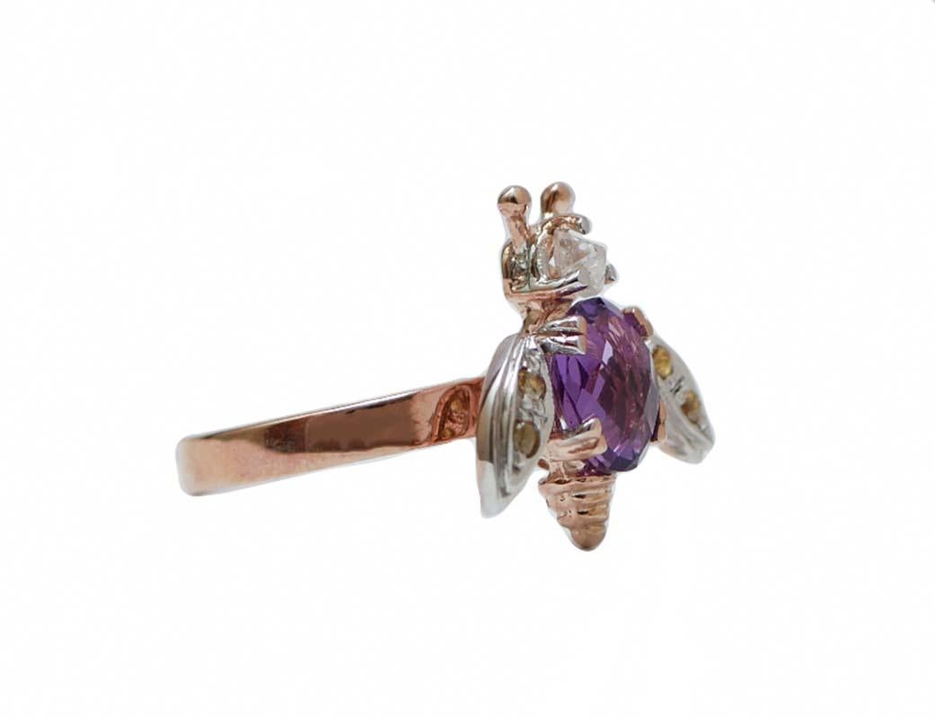 Fly shape ring in 9 karat rose gold and silver structure mounted with a diamond as head, an hydrothermal amethyst  as body and wings studded with diamonds.
This ring was totally handmade by Italian master goldsmiths and it is in perfect