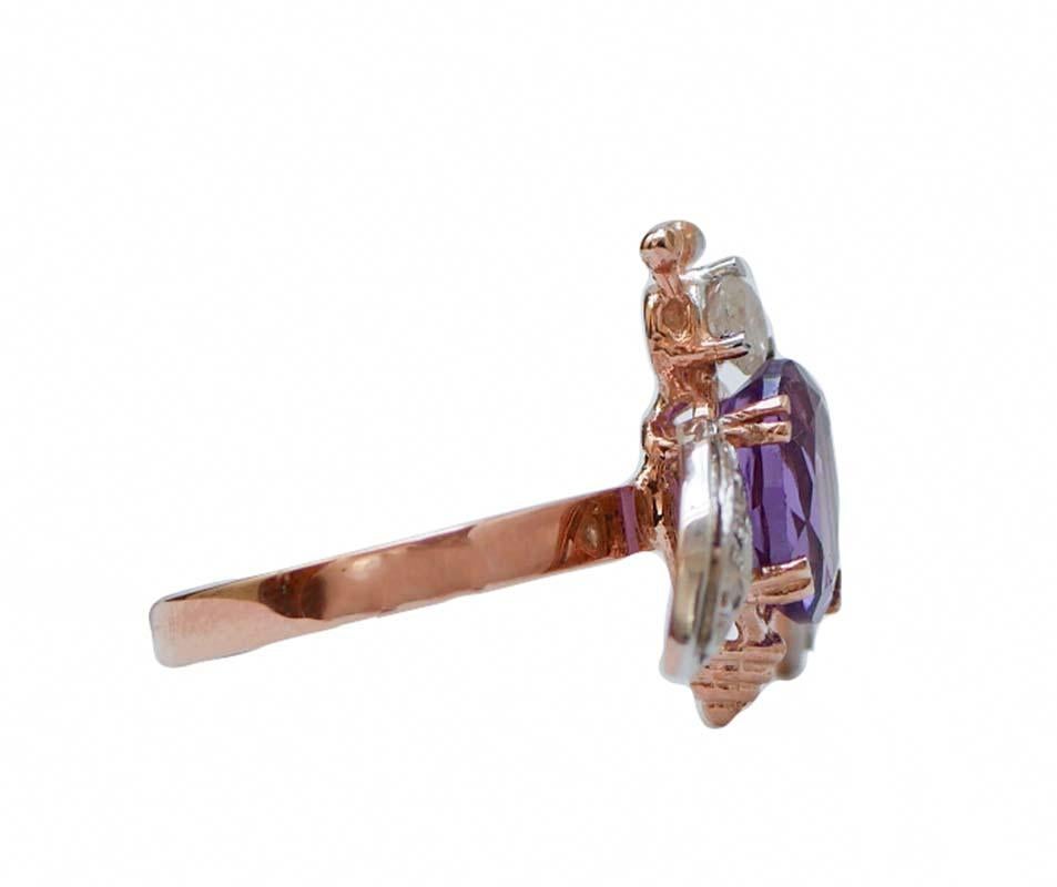 Fashion ring in 9 kt rose gold and silver structure mounted with a diamond on the head and diamonds on the wings. The body is mounted with an amethyst.
This ring was totally handmade by Italian master goldsmiths and it is in perfect
