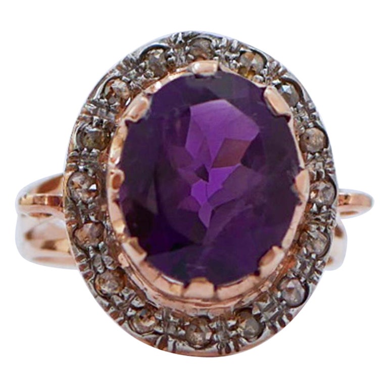 Anello con ametista, diamanti, oro rosa e argento.