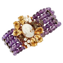 Bracelet en or et argent 9 carats, améthyste, diamants, topazes, grenats, camée, perles