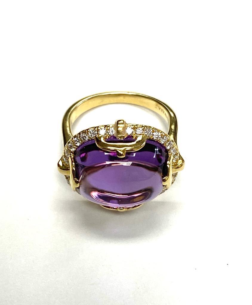 Amethyst East-West Cushion Cabochon Ring With Diamonds in 18K Yellow Gold, from 'Rock N Roll' Collection

Stone Size: 16 x 13 mm

Gemstone Weight: 14.43 Carats

Diamonds: G-H / VS Approx Wt: 0.34 Carats