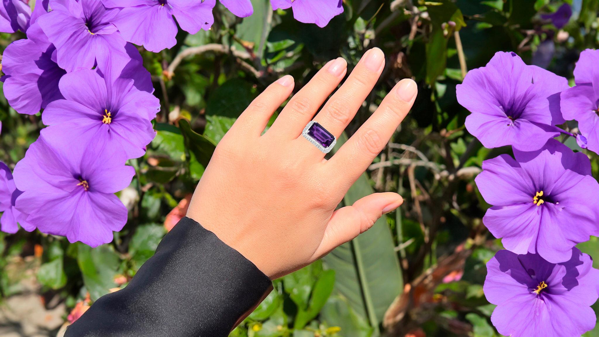 It comes with the Gemological Appraisal by GIA GG/AJP
Amethyst = 5.24 Carats
Origin: Natural, Cut: Emerald
44 White Zircons = 0.25 Carats
Origin: Synthetic, Cut: Round
Metal: Rhodium Plated Sterling Silver
Ring Size: 8* US
*It can be resized