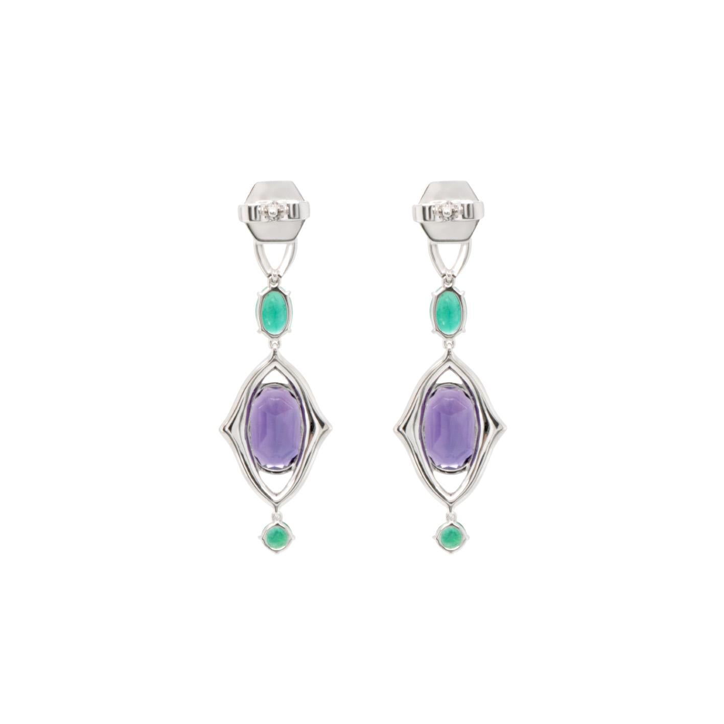 A striking pair of earrings showcasing 4.34 carats of rich hued amethysts, accented with brilliant - cut diamonds and just over 1 carat of vivid Columbian emeralds. Set in 18k white gold, these drop earrings combine bold color with refined elegance