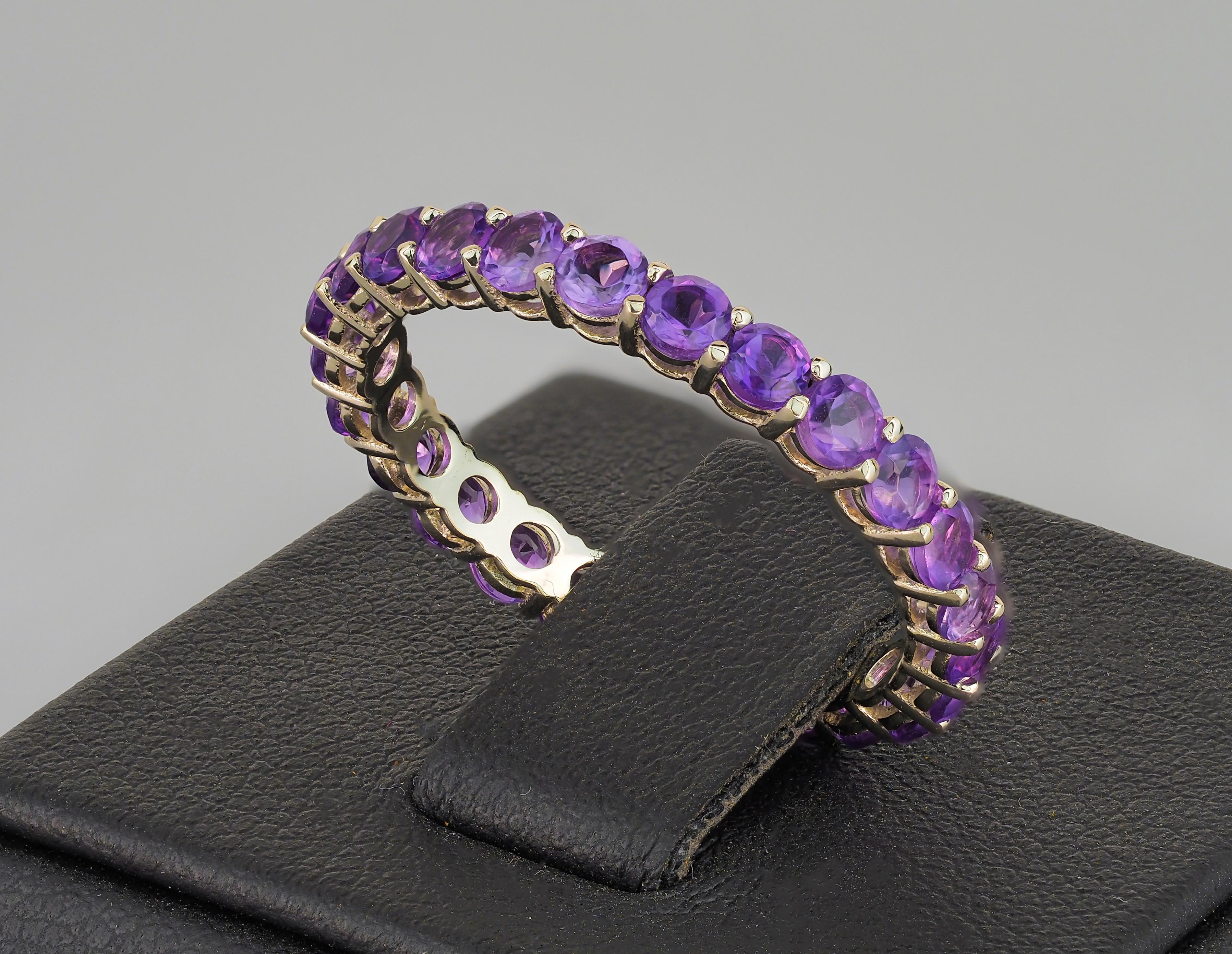 For Sale:  Amethyst eternity ring in 14k gold.  4