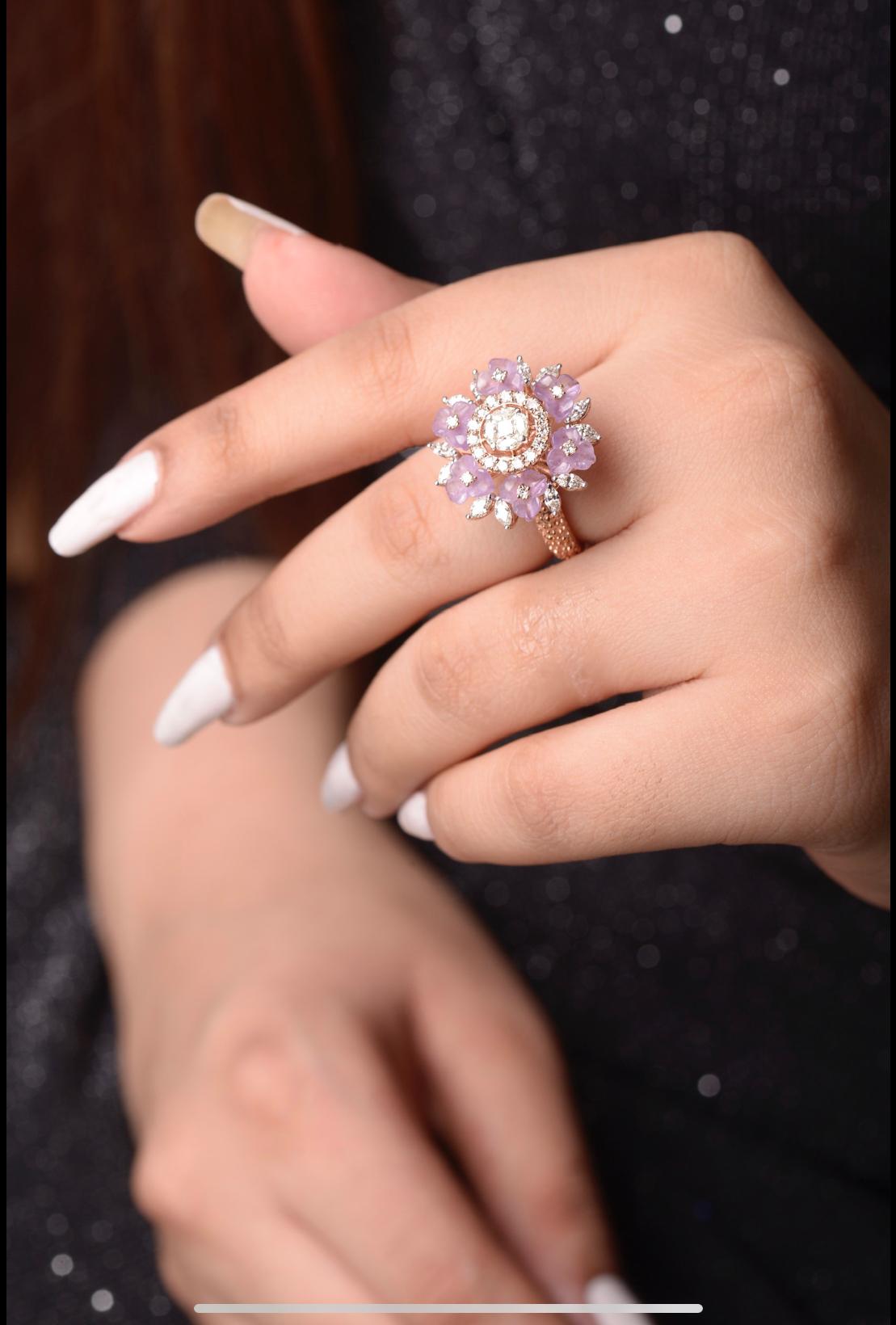 This Dazzling 18K Ring  consists of diamonds and amethyst Flowers