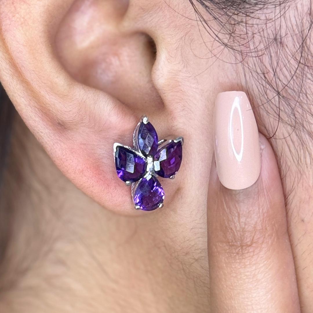 Modernist Amethyst Gemstone Stud Earrings in sterling silver to make a statement with your look. You shall need stud earrings to make a statement with your look. These earrings create a sparkling, luxurious look featuring, marquise cut natural