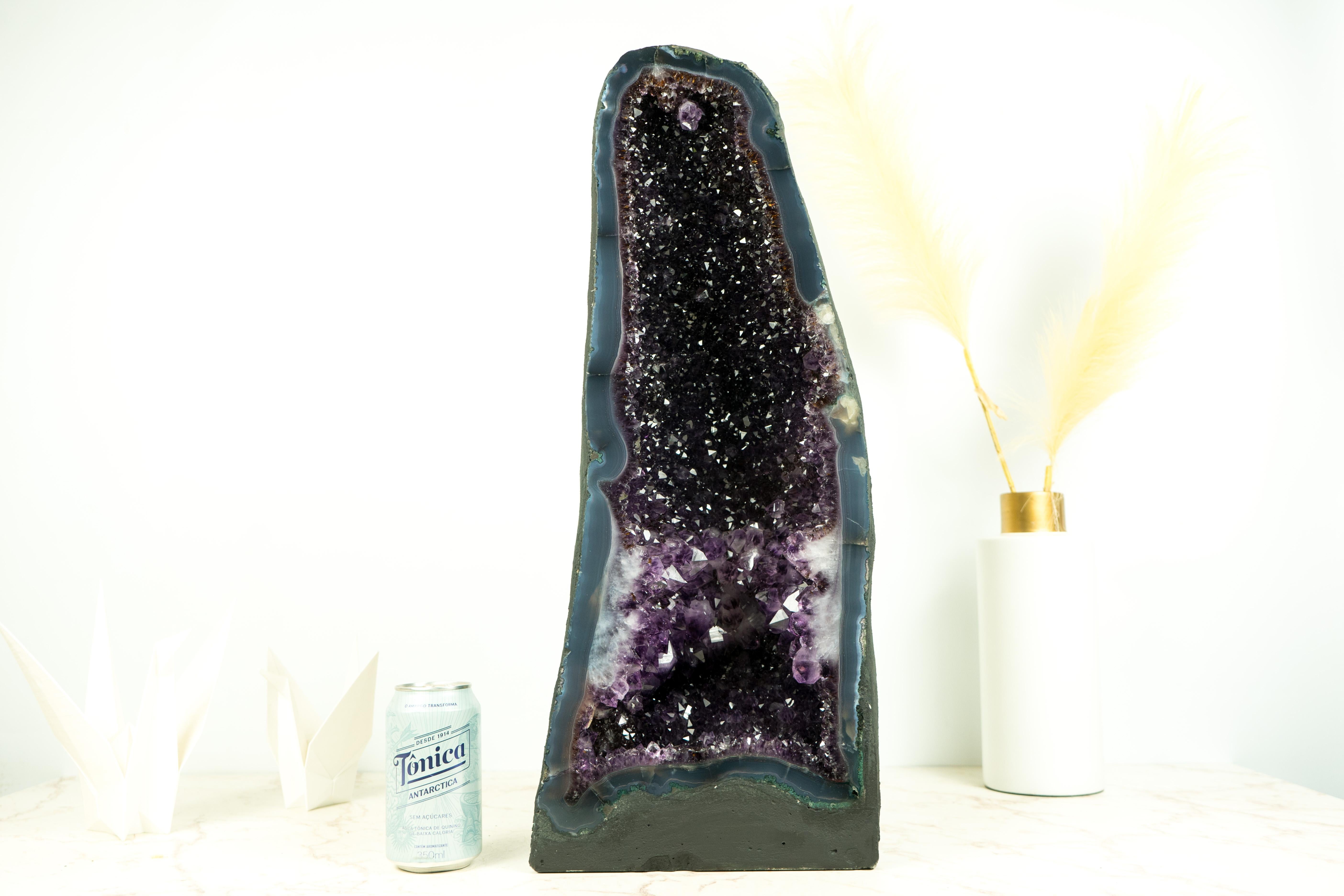 Extraordinary Amethyst on Agate Geode Cathedral: Sparkles of the Deepest Purple, Contrasting with the Deep Blue Agate

▫️ Description

An Amethyst Geode of this extraordinary quality is a once-in-a-lifetime find—a true masterpiece that showcases the